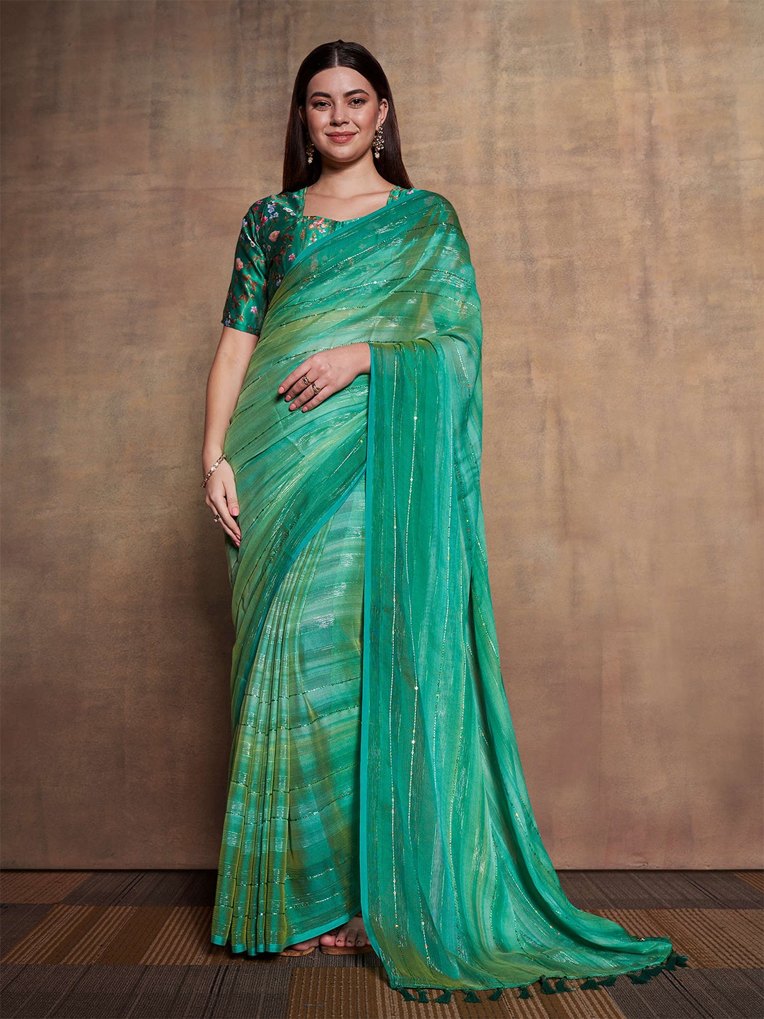 

Mitera Green Striped Sequinned Pure Chiffon Saree
