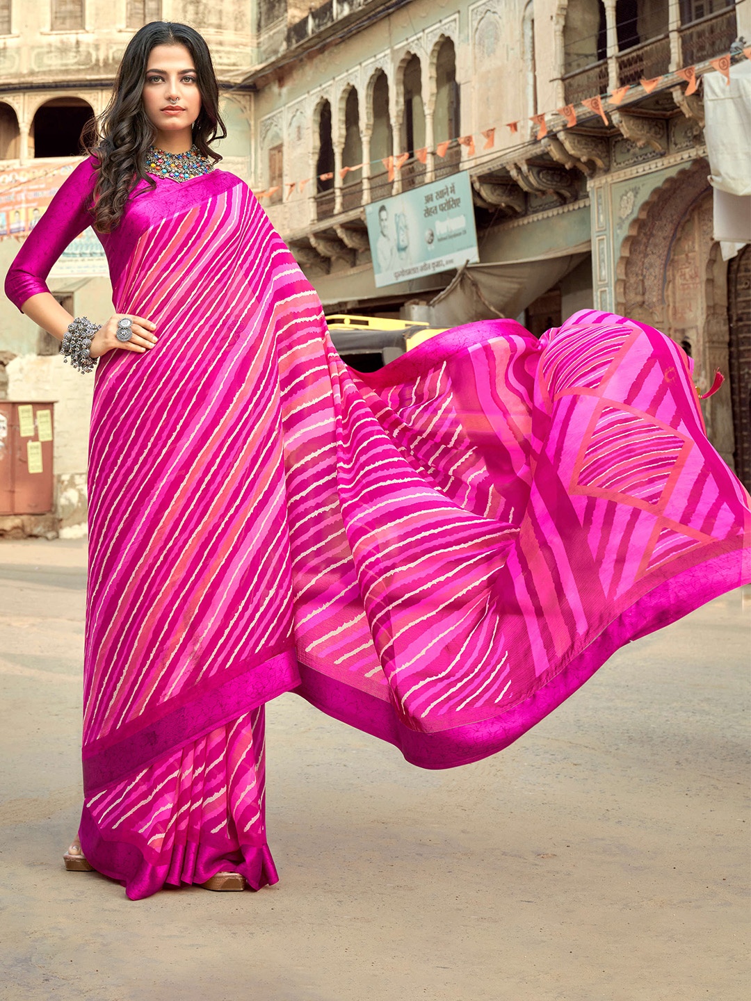 

Mitera Pink & White Leheriya Pure Chiffon Saree