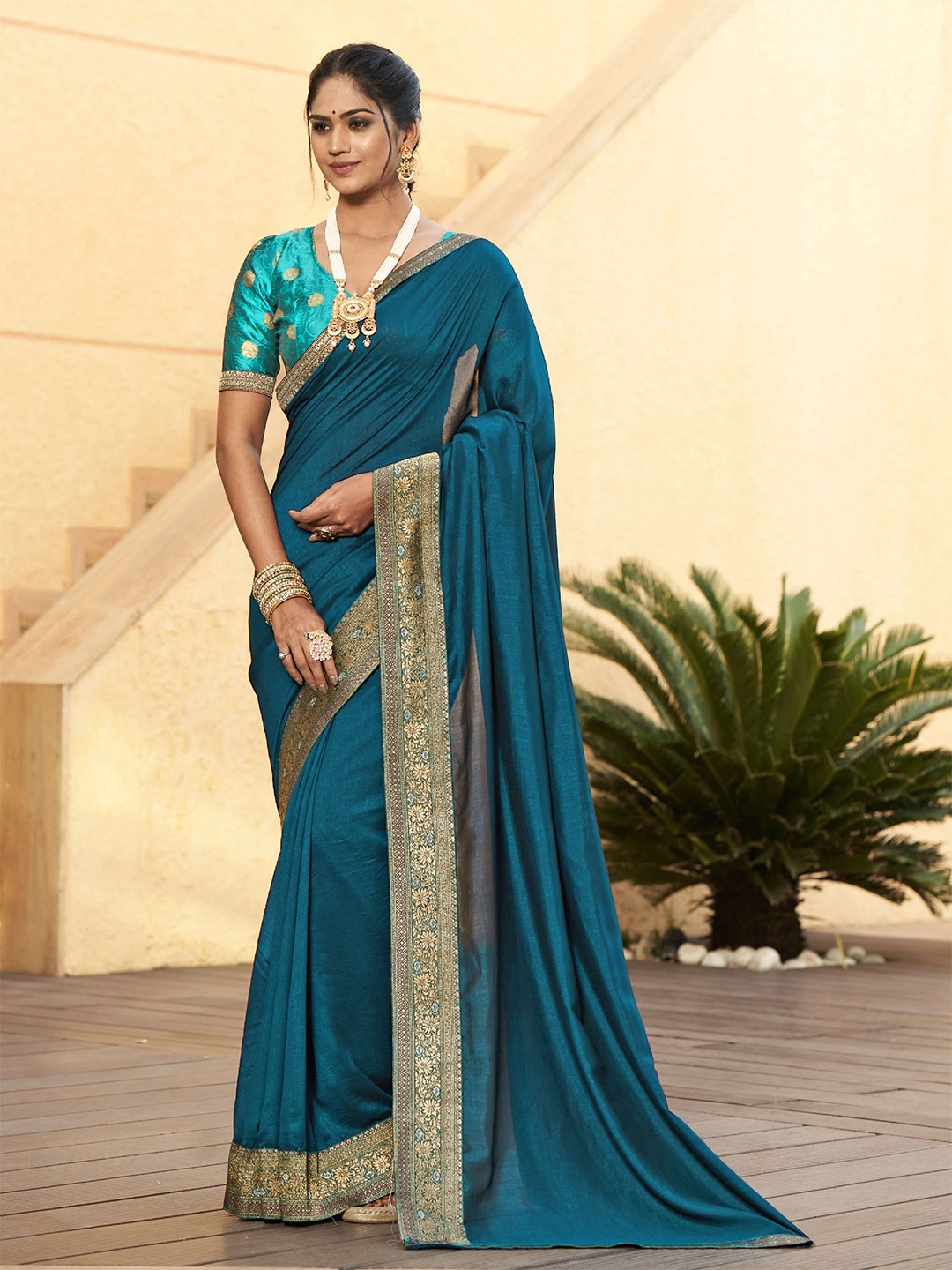

Mitera Navy Blue & Gold-Toned Embroidered Pure Silk Saree