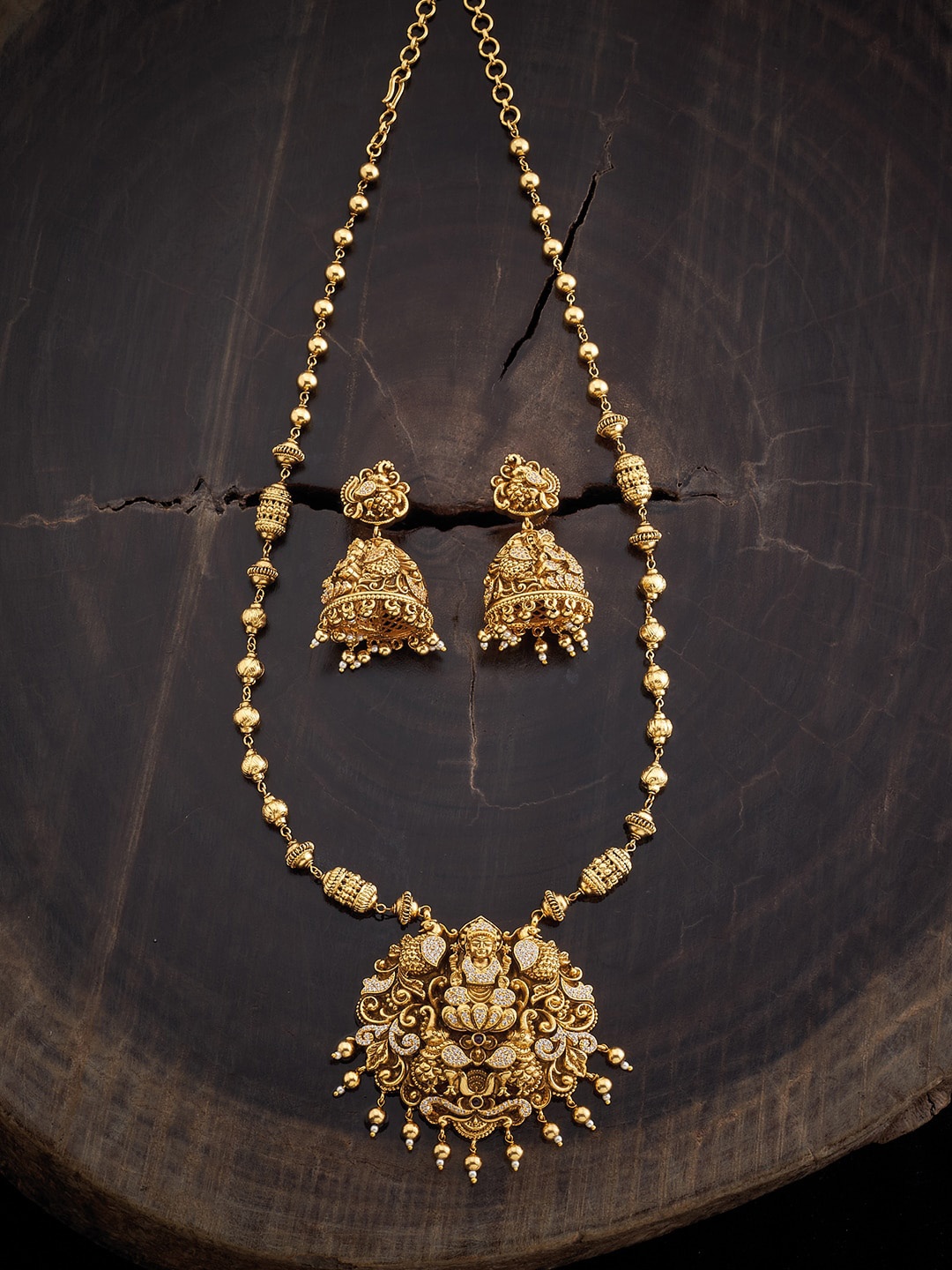 

Kushal's Fashion Jewellery Gold-Plated Stone Studded & Beaded Antique Jewellery Set