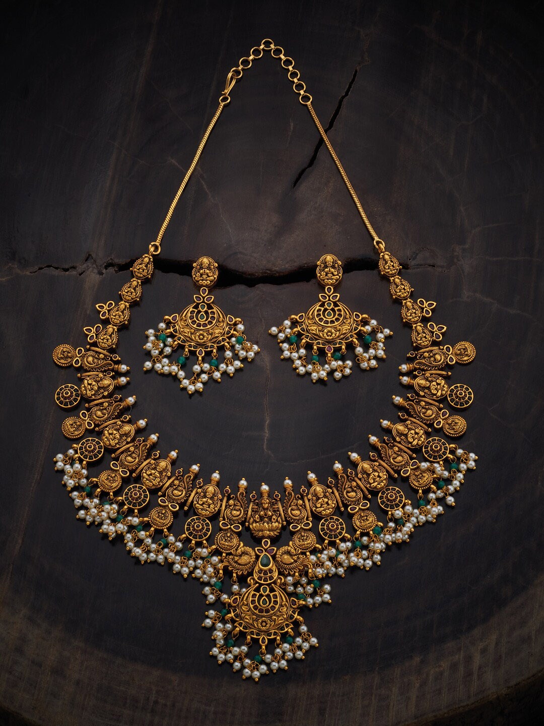 

Kushal's Fashion Jewellery Gold-Plated Stone Studded & Beaded Antique Jewellery Set