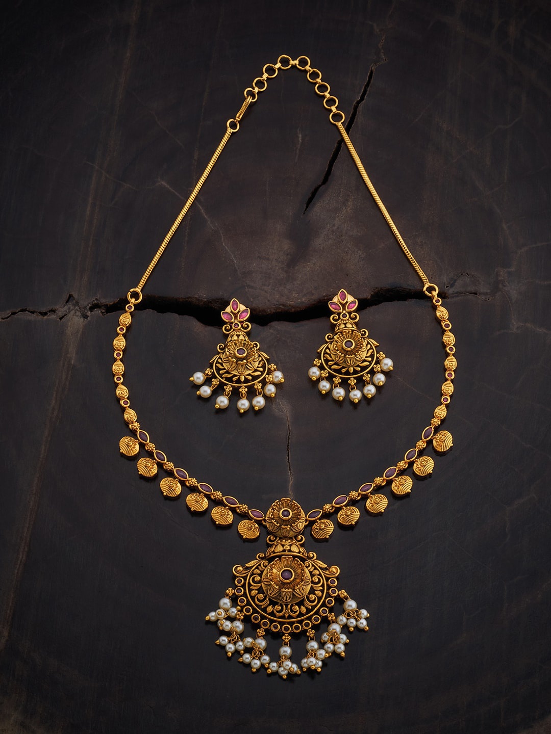 

Kushal's Fashion Jewellery Gold-Plated Stone Studded & Beaded Antique Jewellery Set