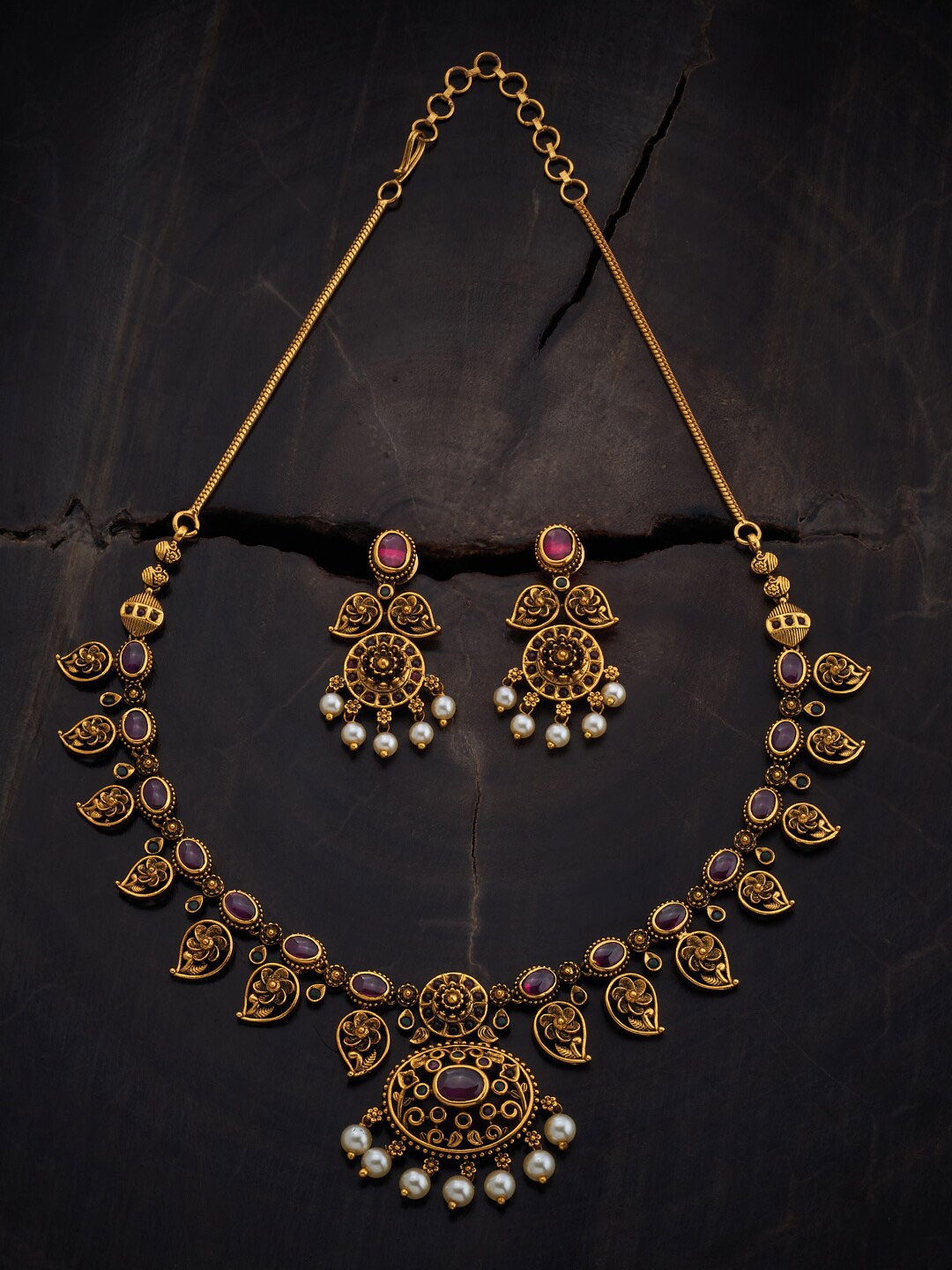 

Kushal's Fashion Jewellery Gold-Plated Stone-Studded Antique Jewellery Set