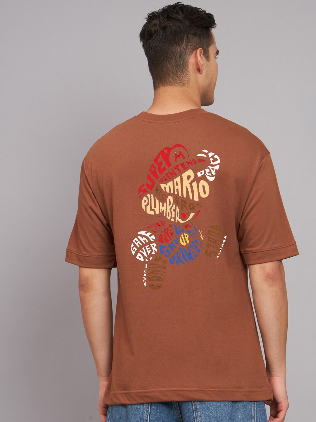 

Imsa Moda Typography Printed Round Neck Drop-Shoulder Sleeves Cotton Oversized T-shirt, Coffee brown