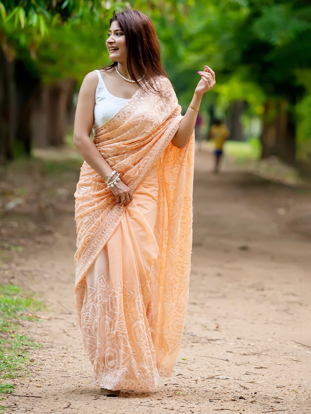 

Anouk Peach-Coloured Embellished Sequinned Pure Georgette Saree
