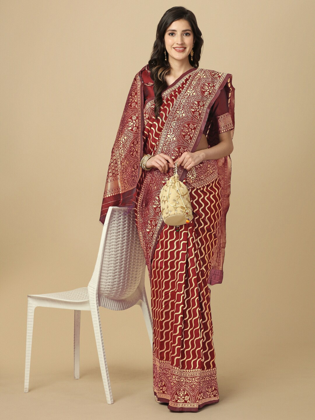 

Mitera Maroon & Gold-Toned Woven Design Zari Silk Blend Leheriya Saree