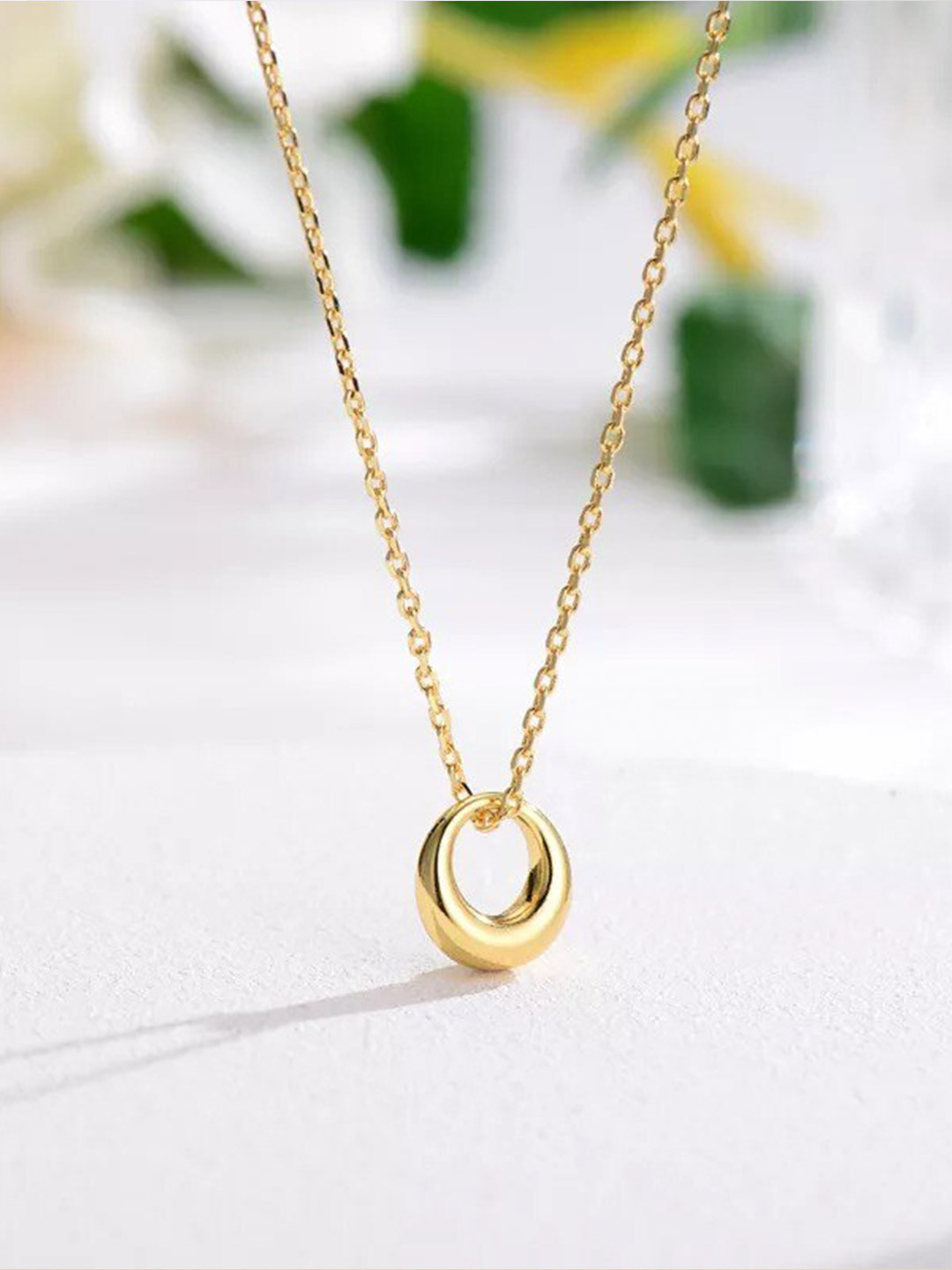

Pinapes Gold-Plated Circular Pendant With Chain