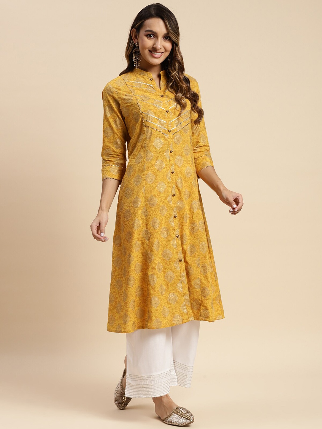 

Rangita Ethnic Motifs Printed Mandarin Collar Pure Cotton A-Line Kurta, Yellow