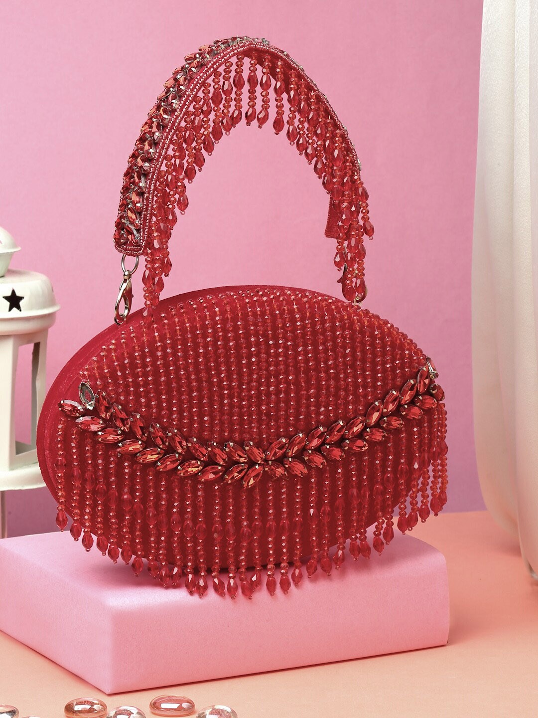 

Anekaant Red Embellished Tasselled Half Moon Clutch
