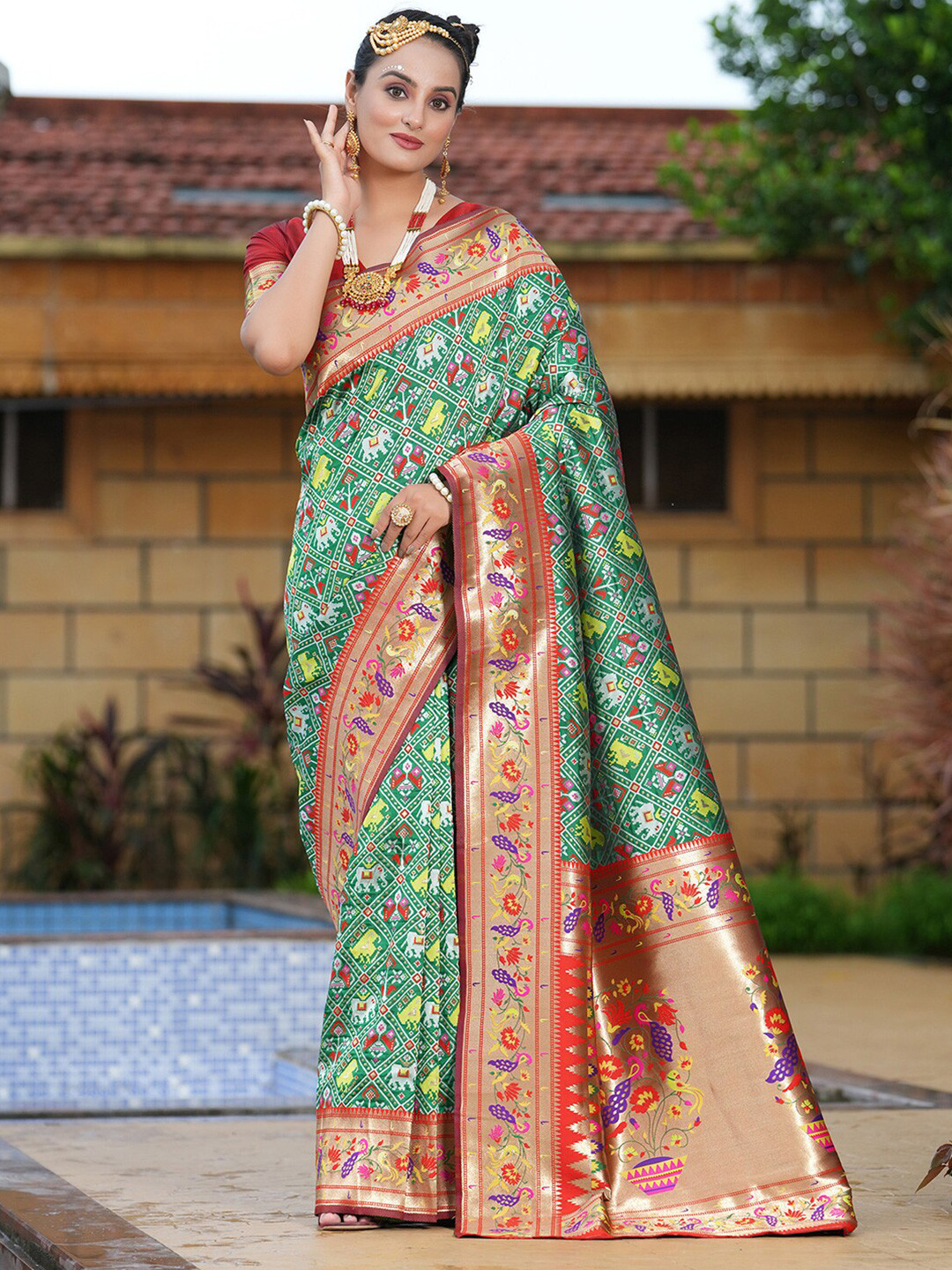 

Satrani Ethnic Motifs Printed Zari Art Silk Patola Saree, Green