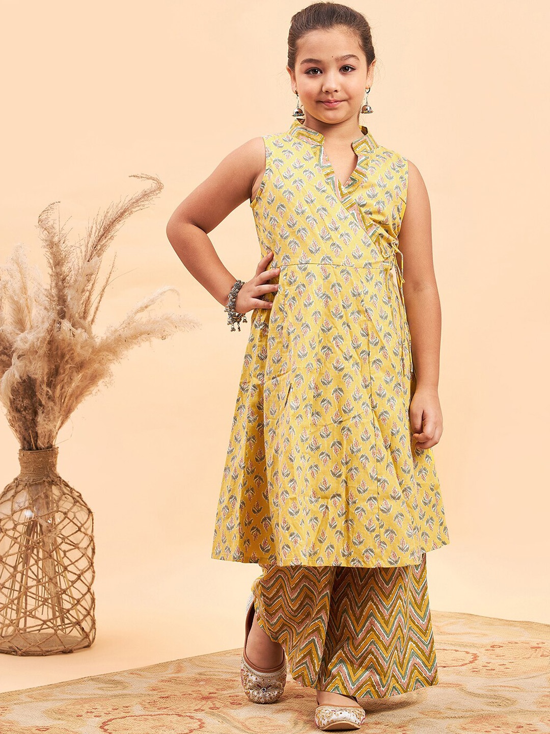 

Stylo Bug Girls Ethnic Motifs Printed Angrakha Gotta Patti Pure Cotton Kurta with Palazzos, Mustard