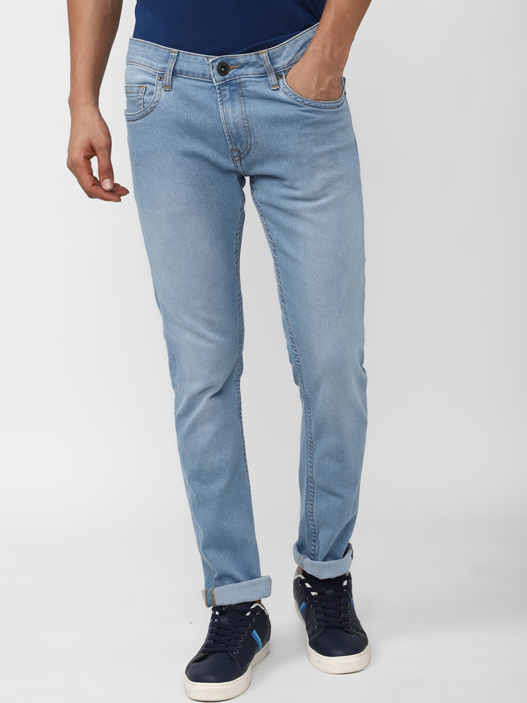 

Peter England Casuals Men Tapered Fit Mid-Rise Light Fade Stretchable Jeans, Blue
