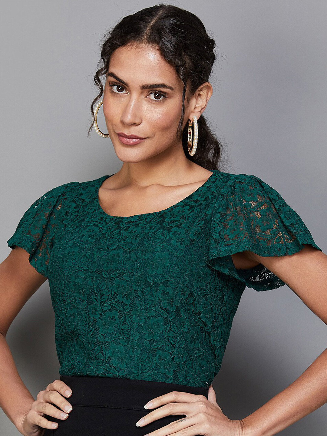 

CODE by Lifestyle Floral Self Design Flared Sleeves Top, Green