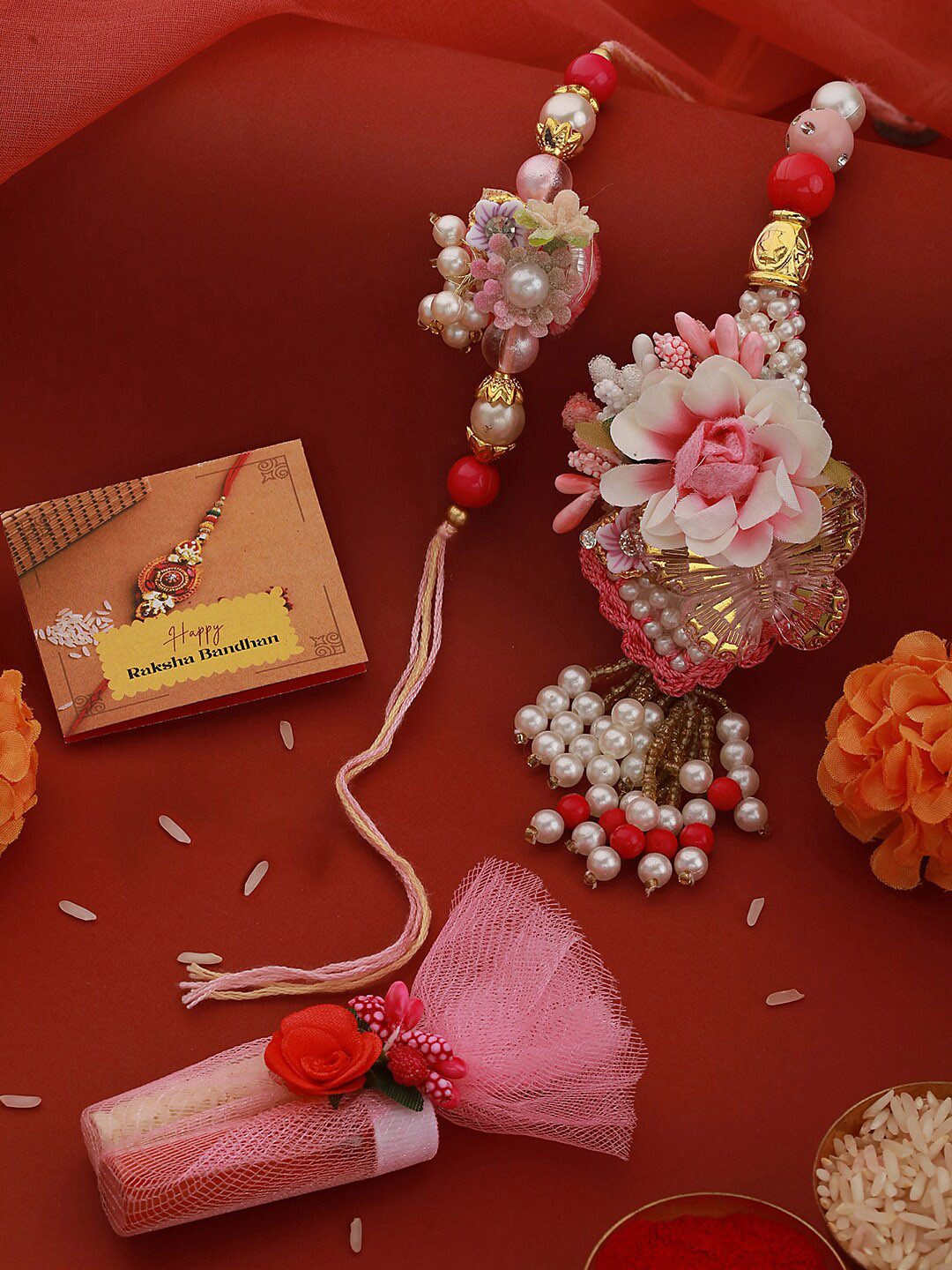 

Saraf RS Jewellery Unisex Set of 2 Pearls & Flower Beaded Lumba Rakhi Gift Set, Pink