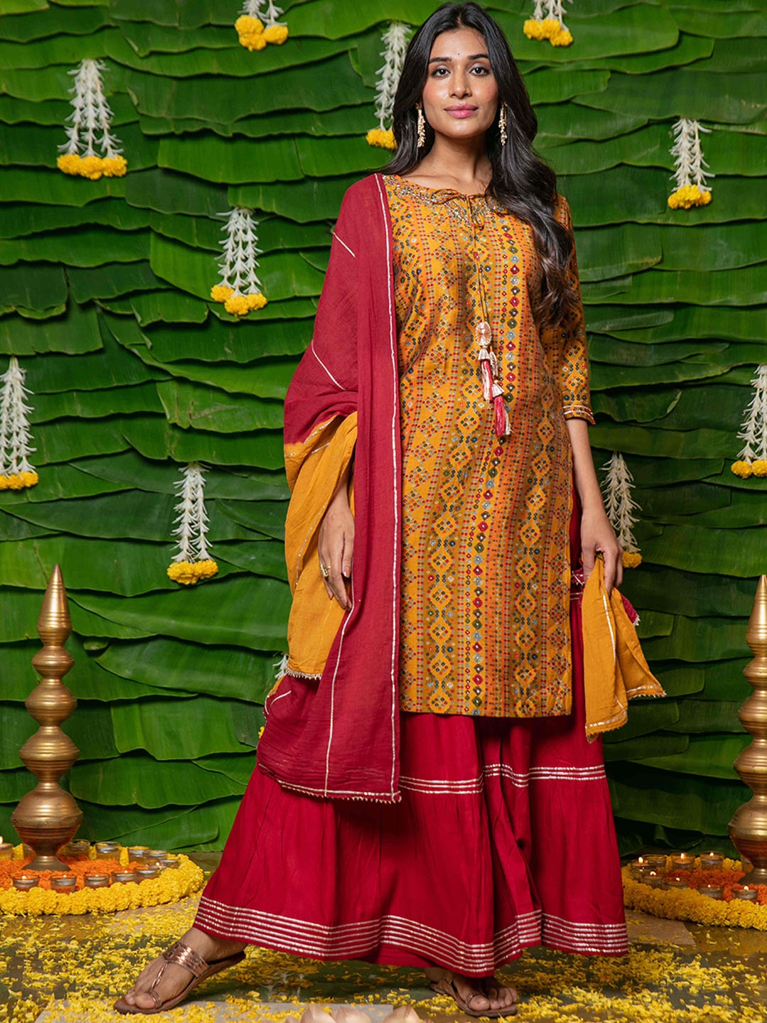 

RAISIN Ethnic Motifs Printed Thread Work Detail Pure Cotton Kurta & Sharara With Dupatta, Mustard