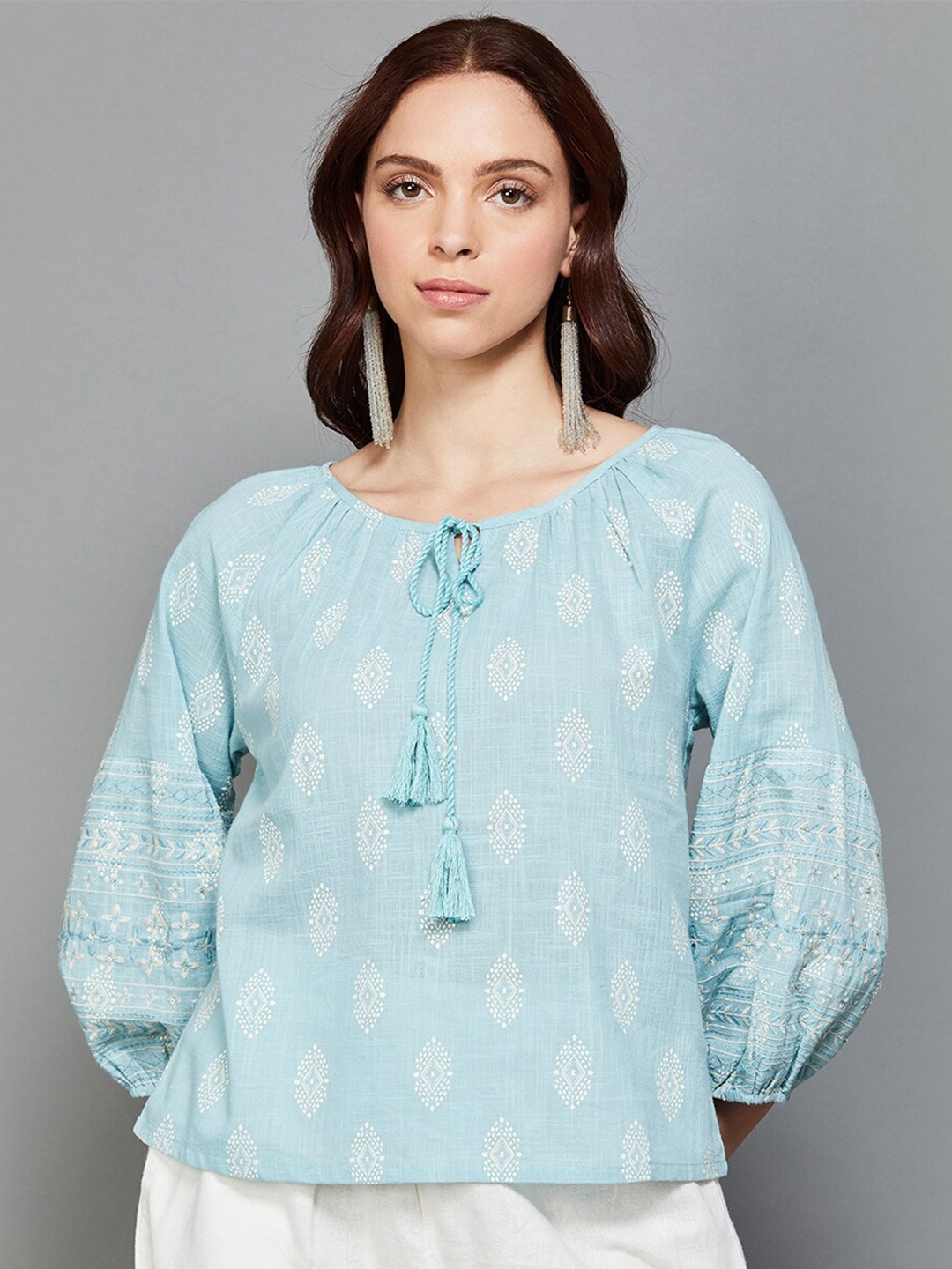 

Colour Me by Melange Ethnic Motifs Printed Tie Up Neck Puffed Sleeves Cotton Top, Blue