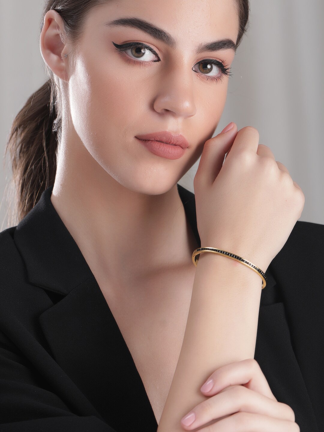 

Rubans Voguish 22K Gold plated Stainless Steel Waterproof Zirconia Studded Bracelet