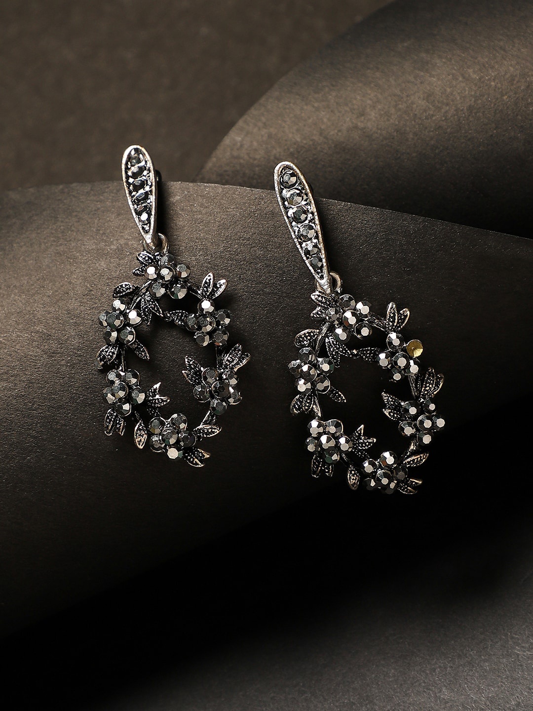 

SOHI Silver-Plated Contemporary Drop Earrings