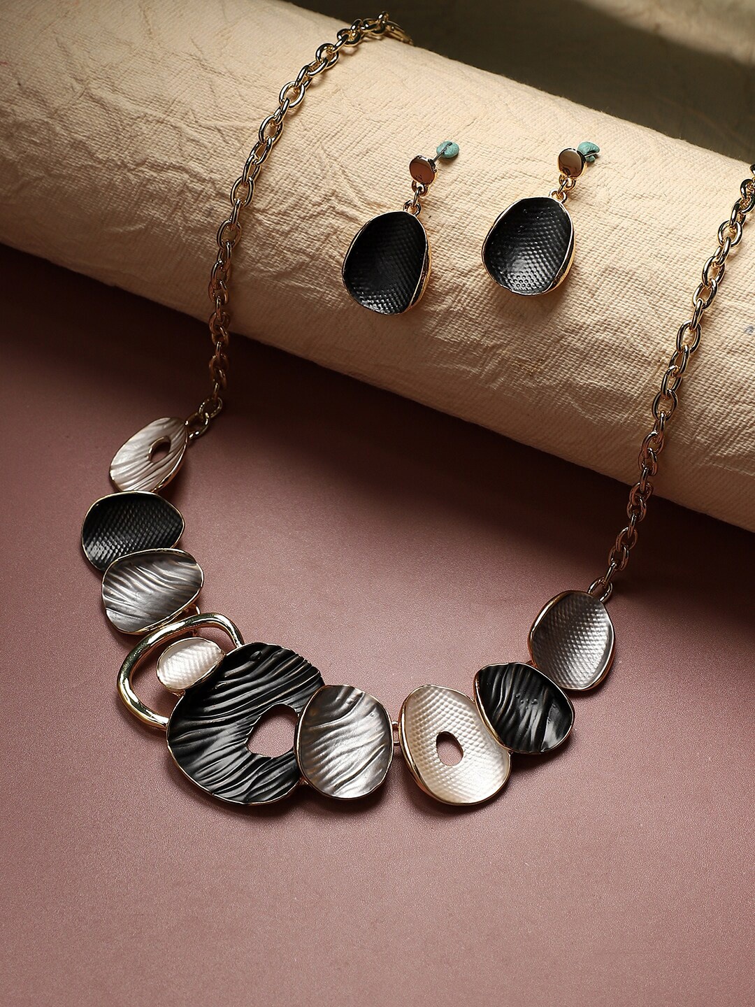 

SOHI Gold-Plated Textured Abstract Jewellery Set