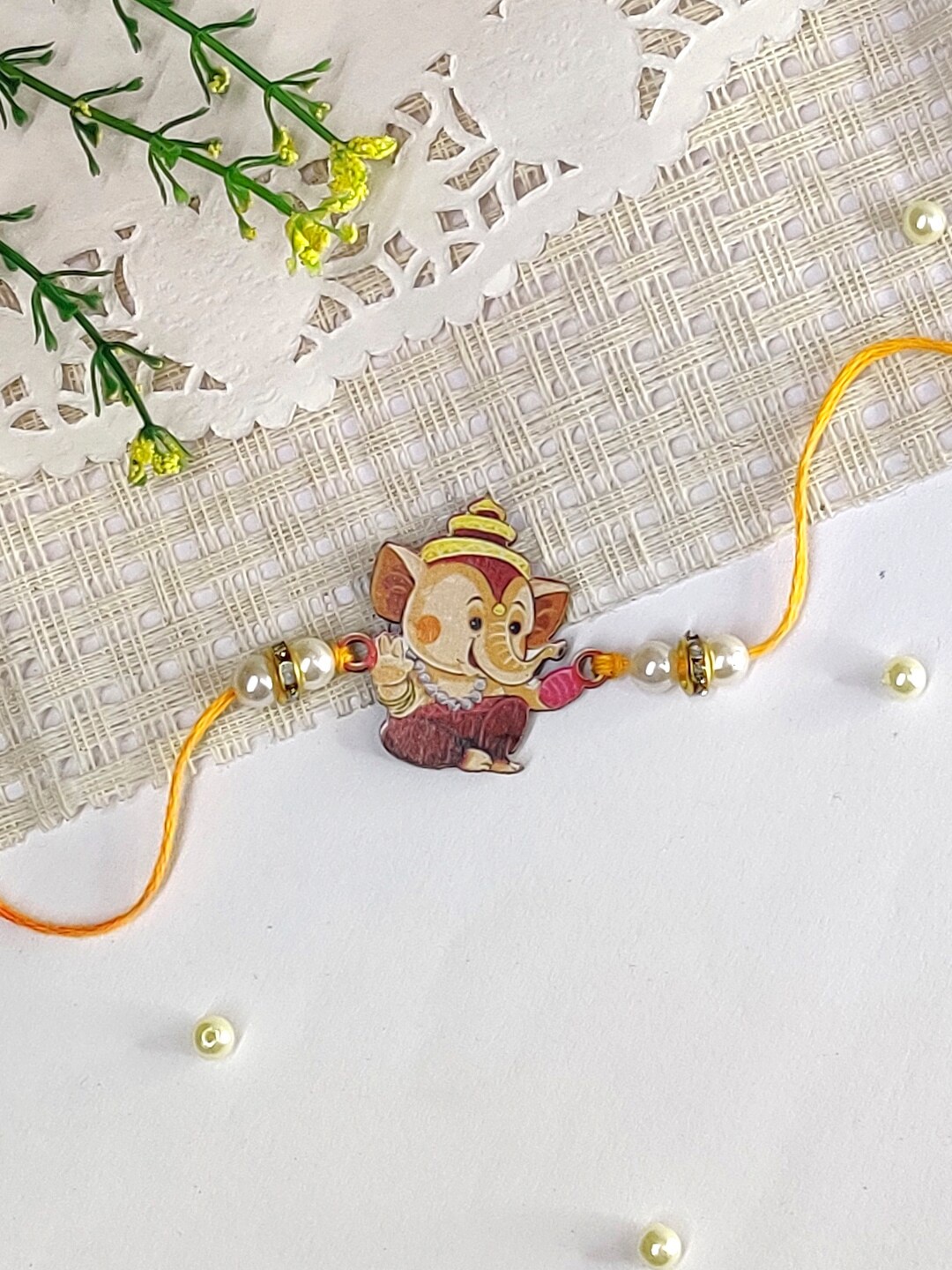 

The Magic Wand Boys Ganesh Charm Rakhi, Yellow