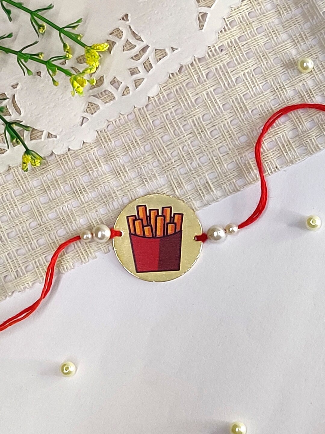 

The Magic Wand Boys Fries Charm Rakhi, Maroon