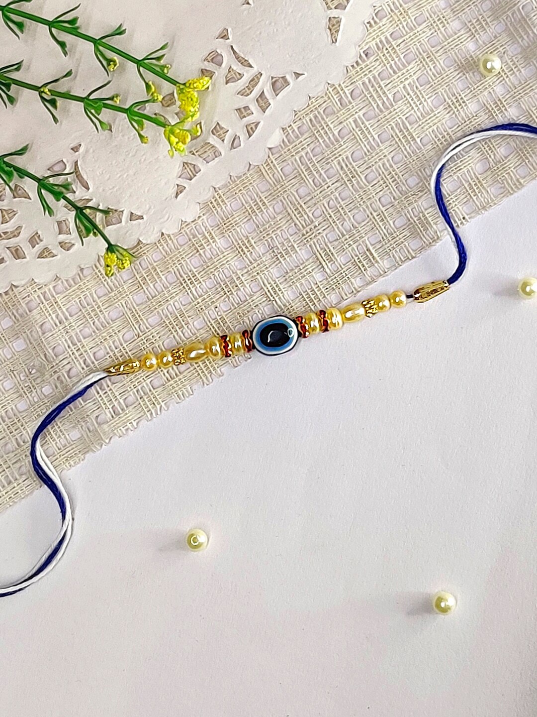 

The Magic Wand Boys Pearl Beaded Evil Eye Charm Rakhi, Blue