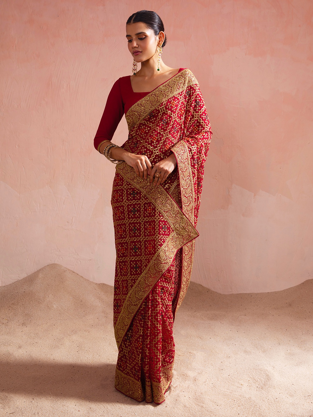 

Soch Maroon & Gold-Toned Ethnic Motifs Embroidered Poly Georgette Saree