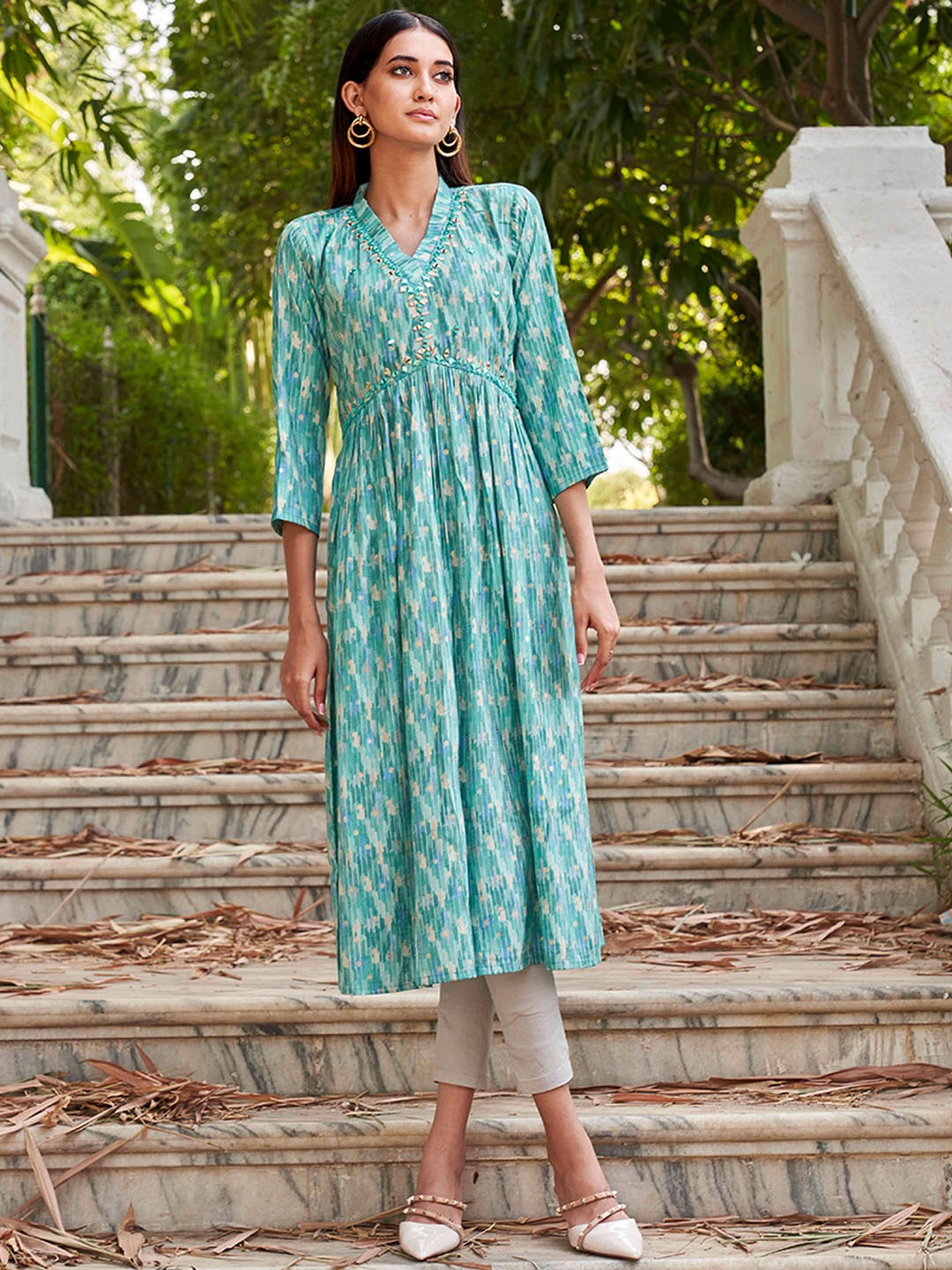 

Tikhi Imli Turquoise Blue & Beige Floral Printed Mirror Work Anarkali Kurta