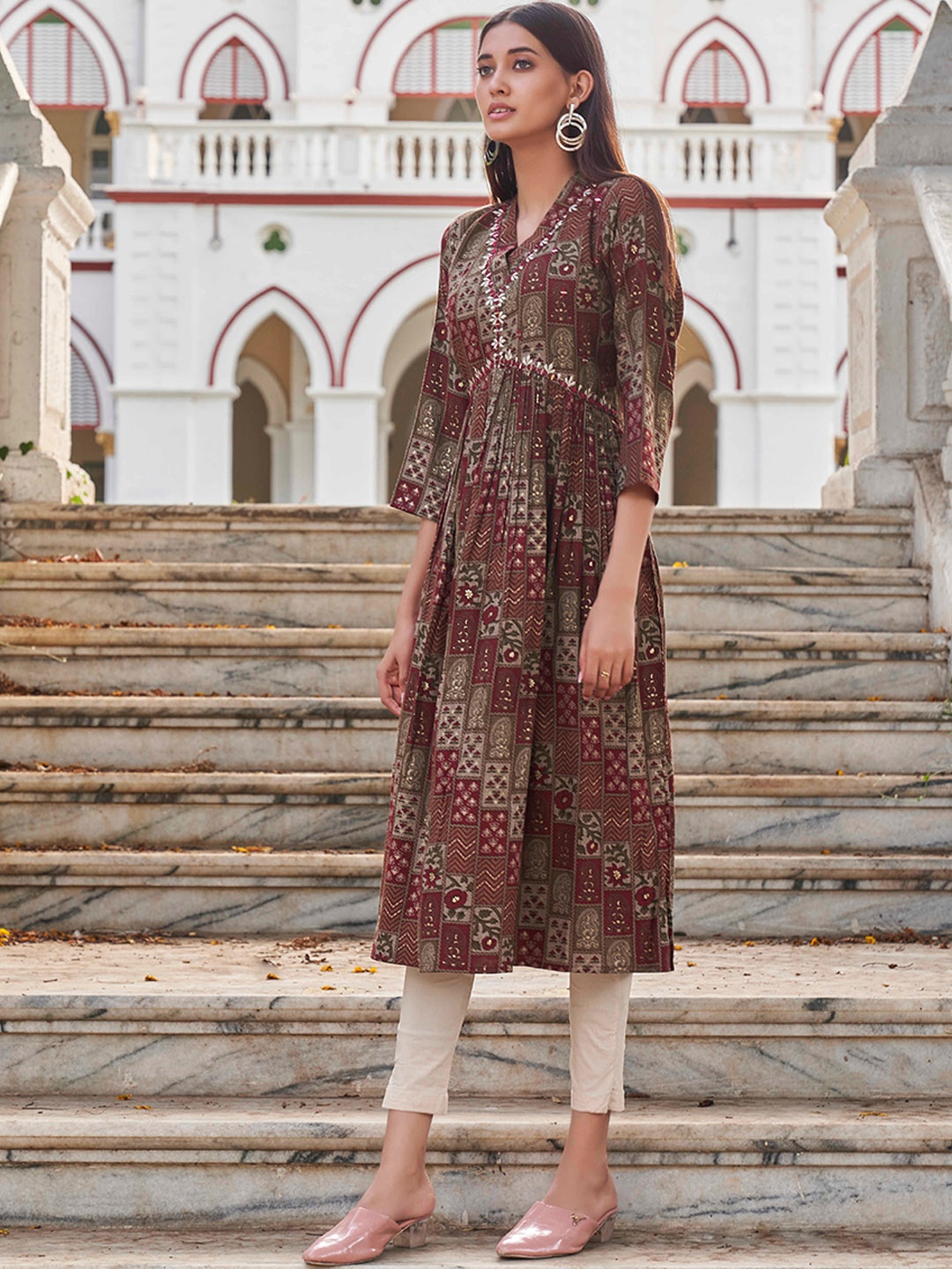 

Tikhi Imli Paisley Ethnic Motifs Embroidered Empire A-Line Kurta, Maroon