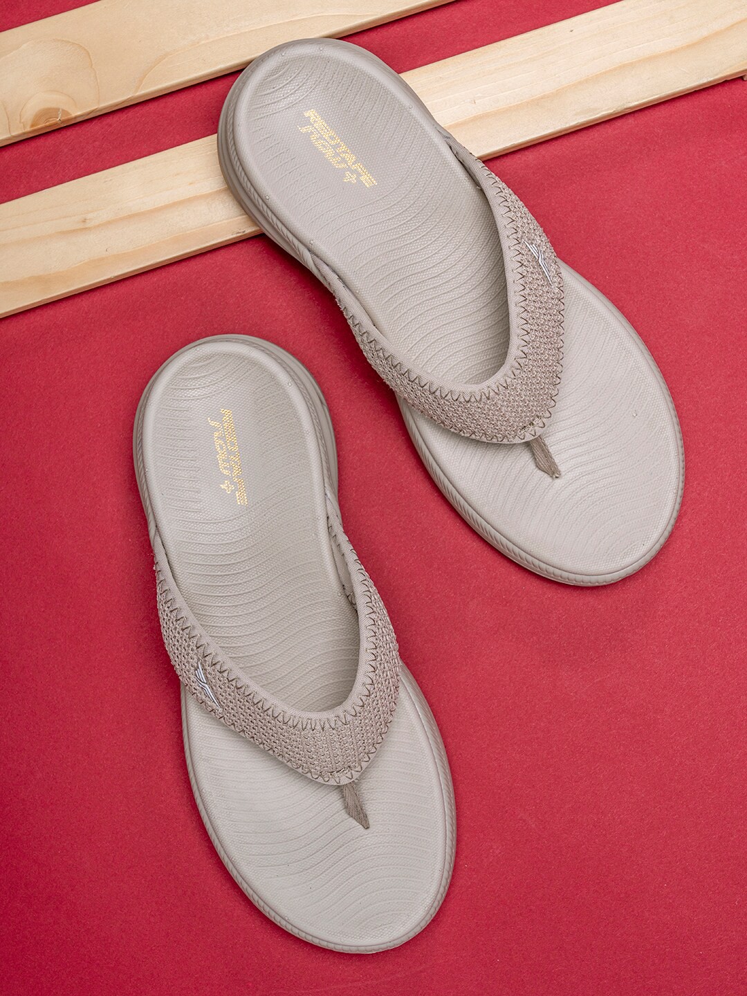 

Red Tape Women Textured Thong Flip-Flops, Beige