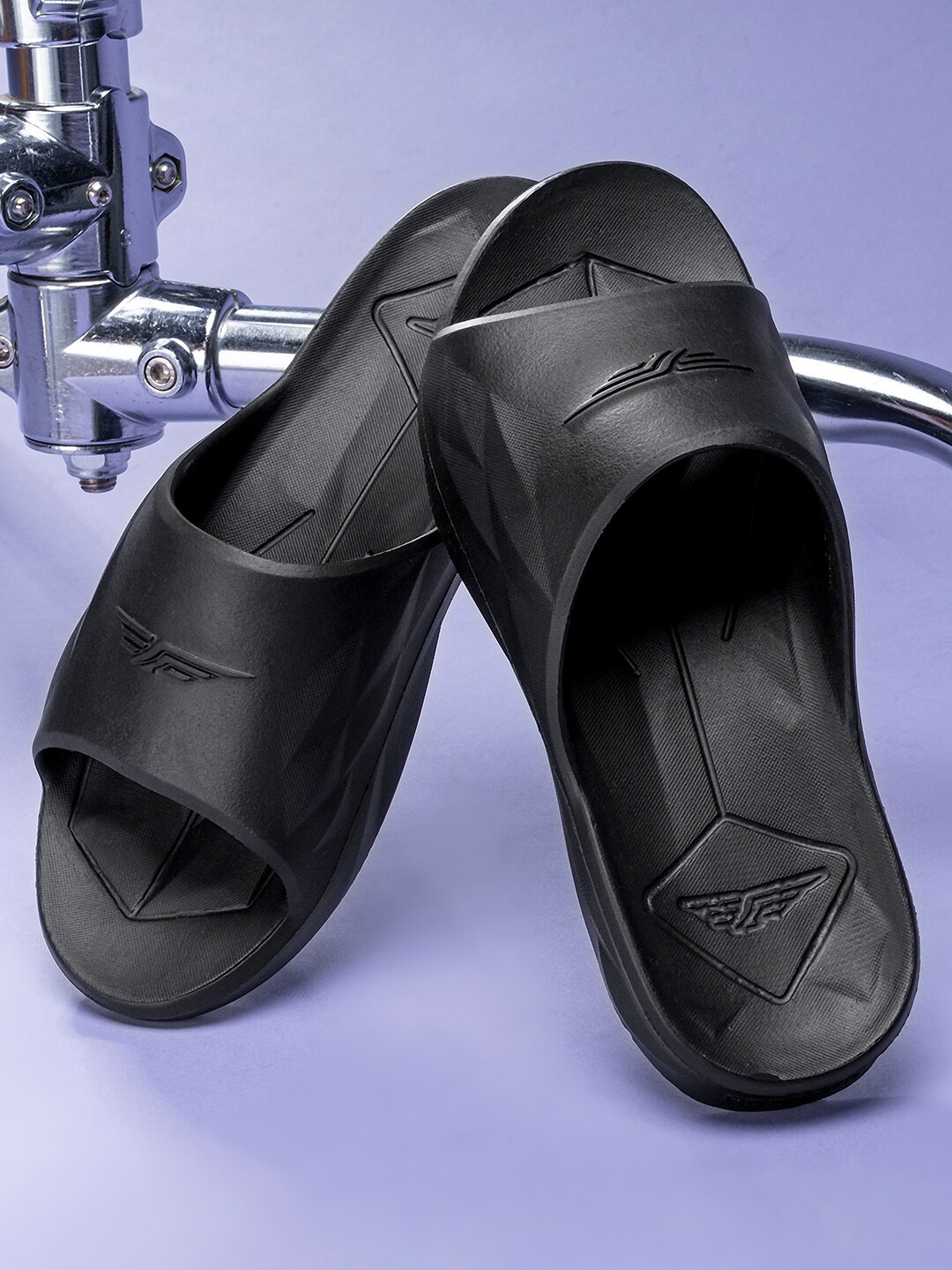 

Red Tape Women Brand Logo Self Design Rubber Sliders, Black