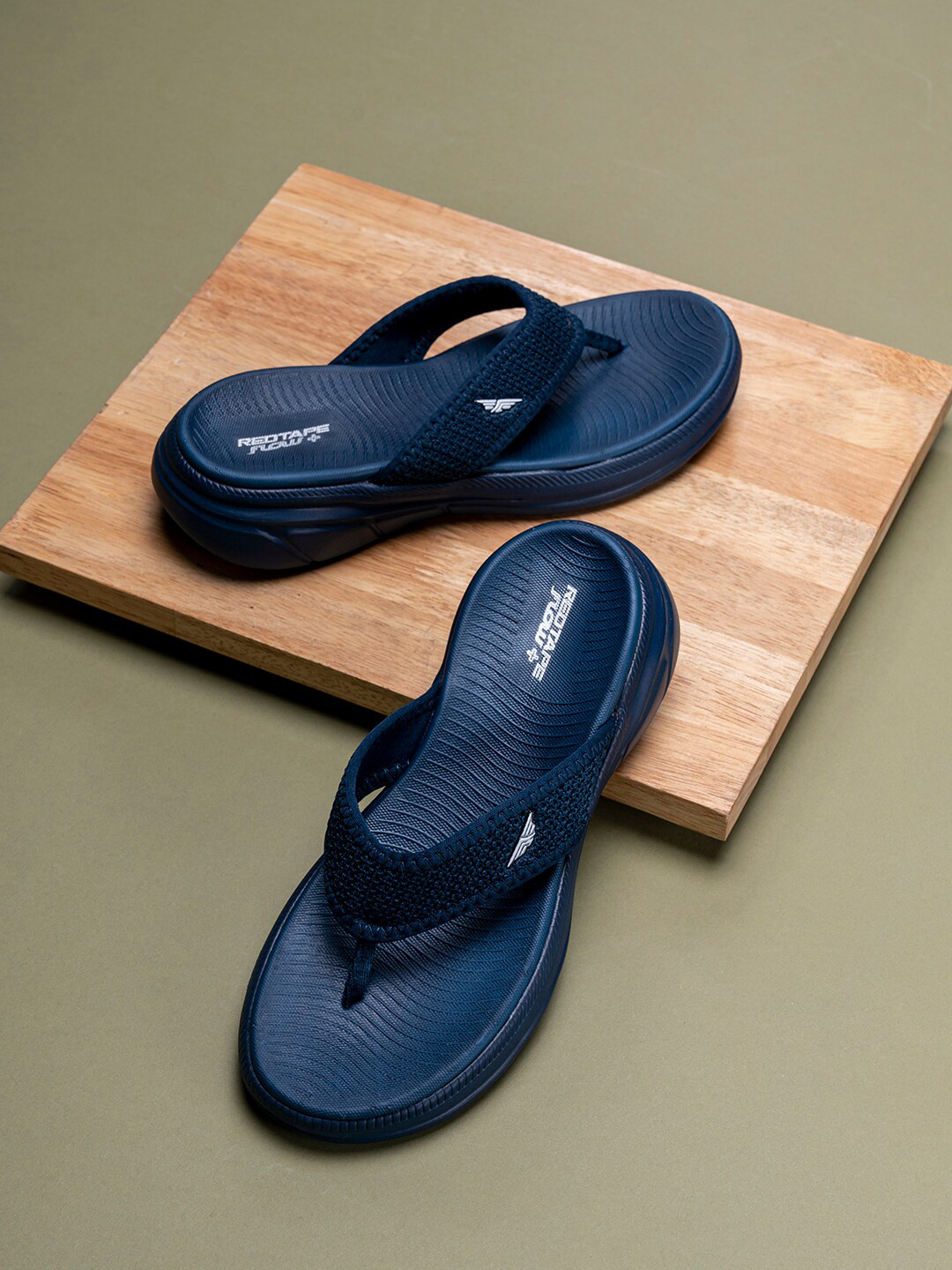 

Red Tape Women Self Design Thong Flip-Flops, Navy blue