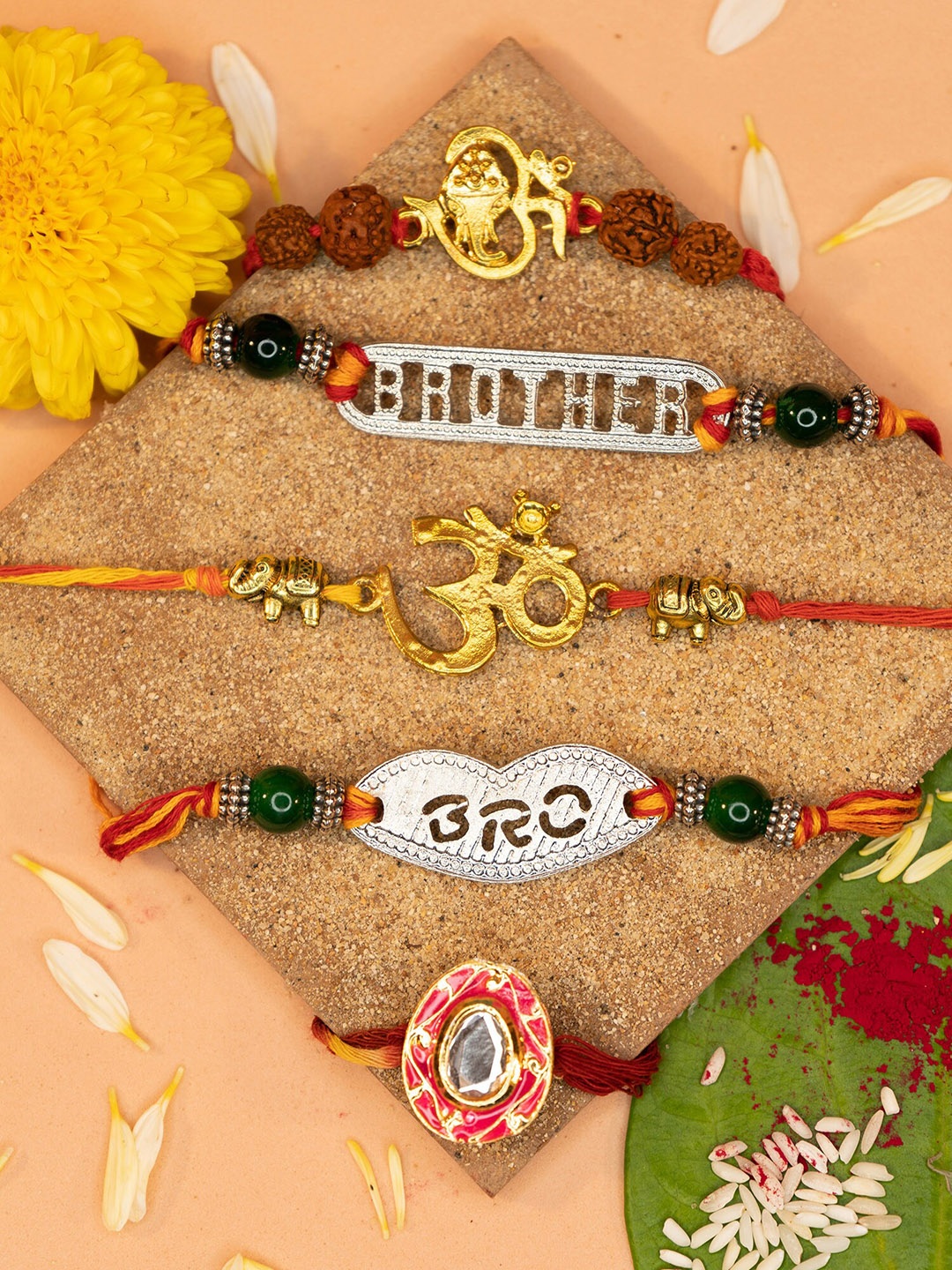 

Yellow Chimes Set Of 4 Traditional Om Rakhi With Roli Chawal & Greeting Card, Multi