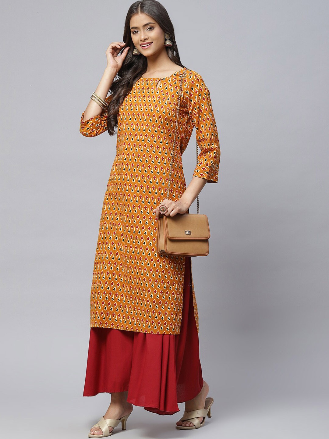 

Aarika Quirky Printed Keyhole Neck Quirky Straight Kurta, Mustard