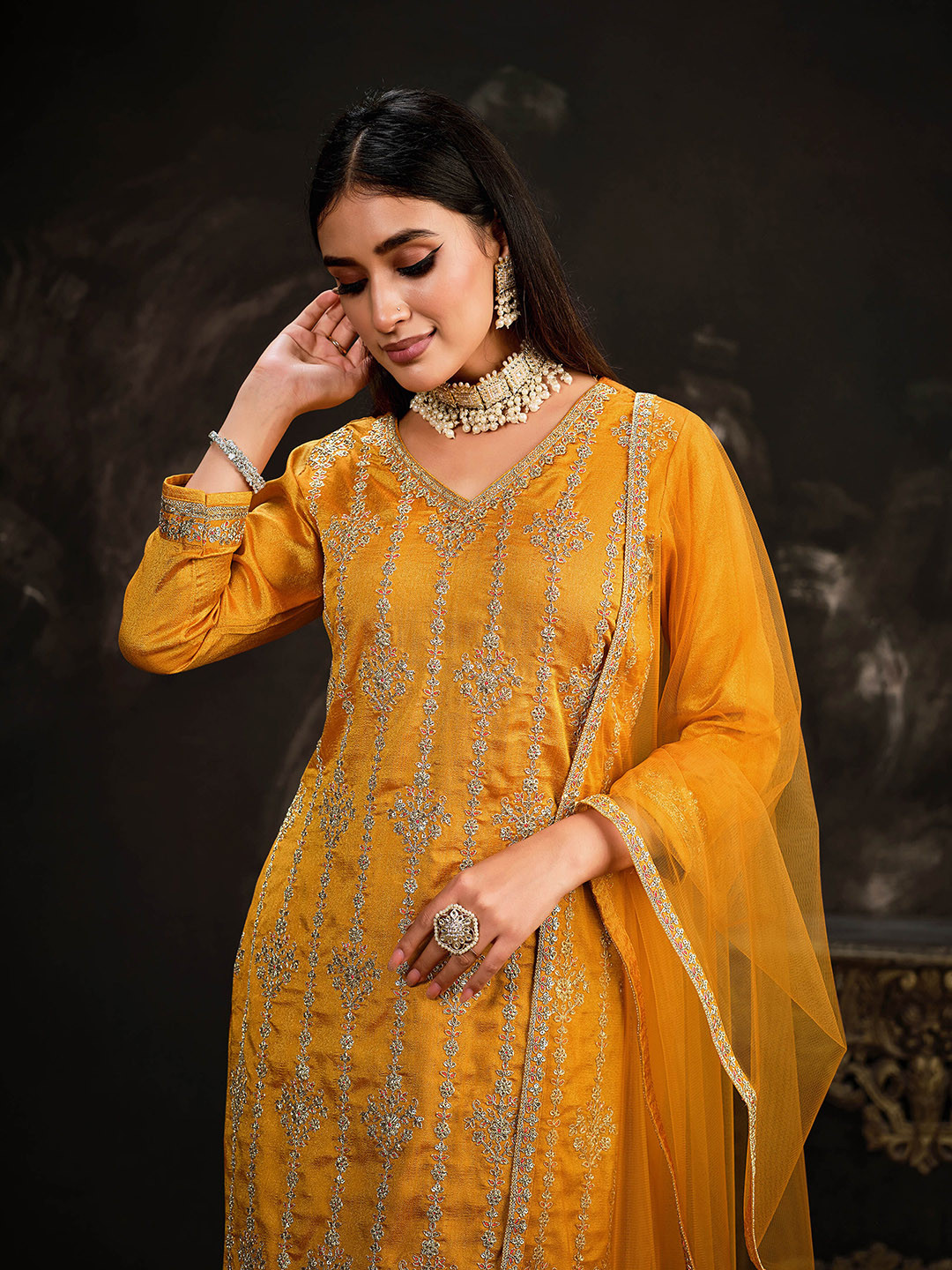 

Sangria Yellow Color Floral Embroidered V-NeckBeads and Stones Kurta Set With Dupatta, Mustard