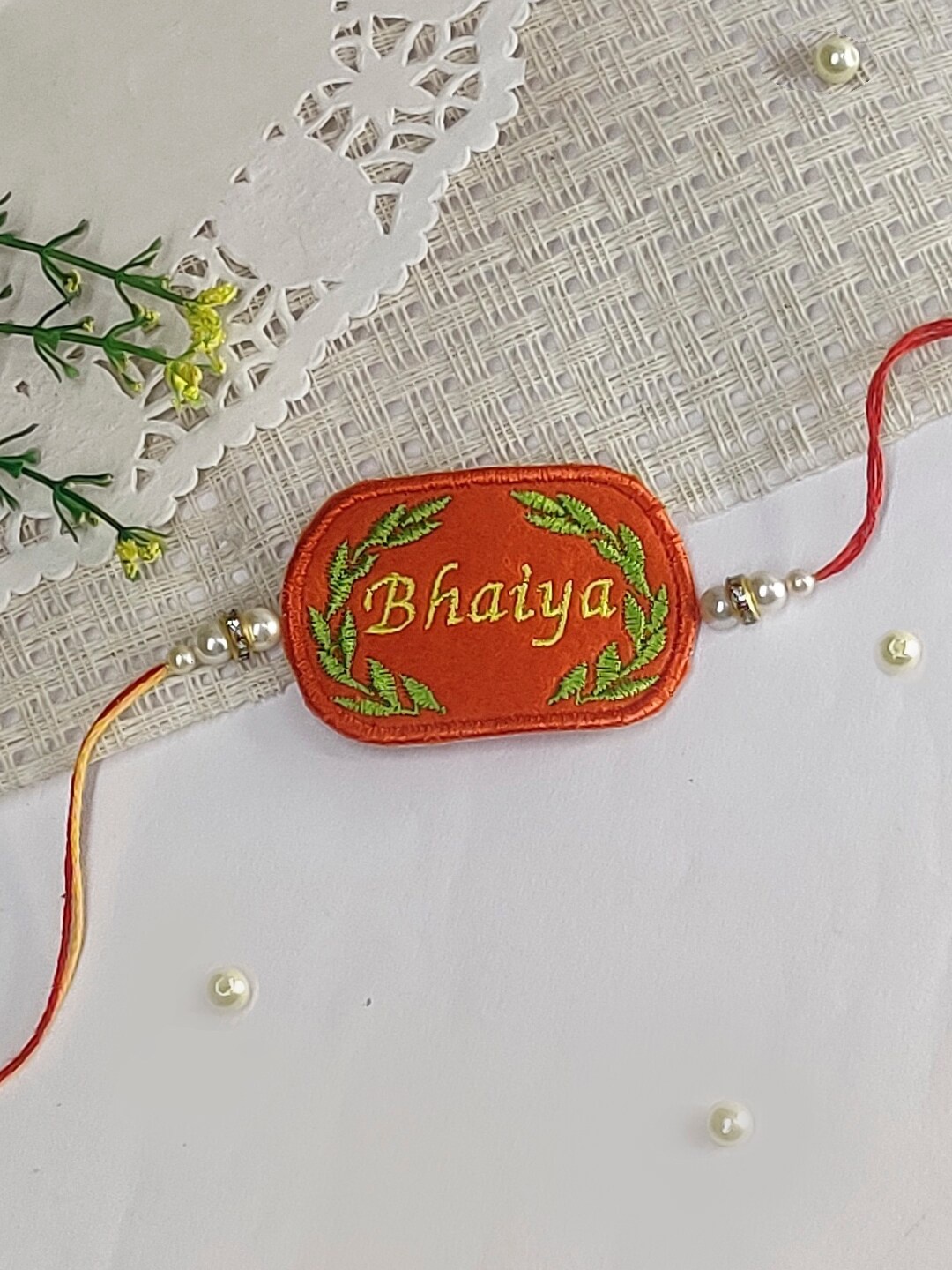 

The Magic Wand Pearl Beaded Charm Rakhi, Rust