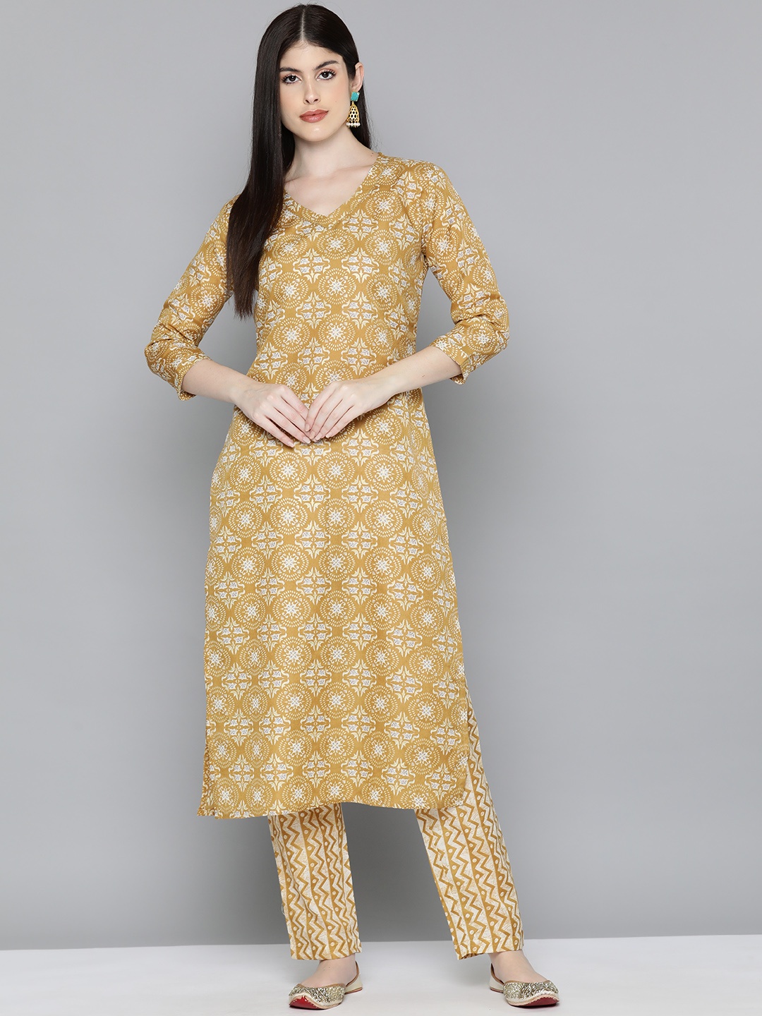 

Kvsfab Women Ethnic Motifs Printed Regular Kurta with Trousers, Mustard