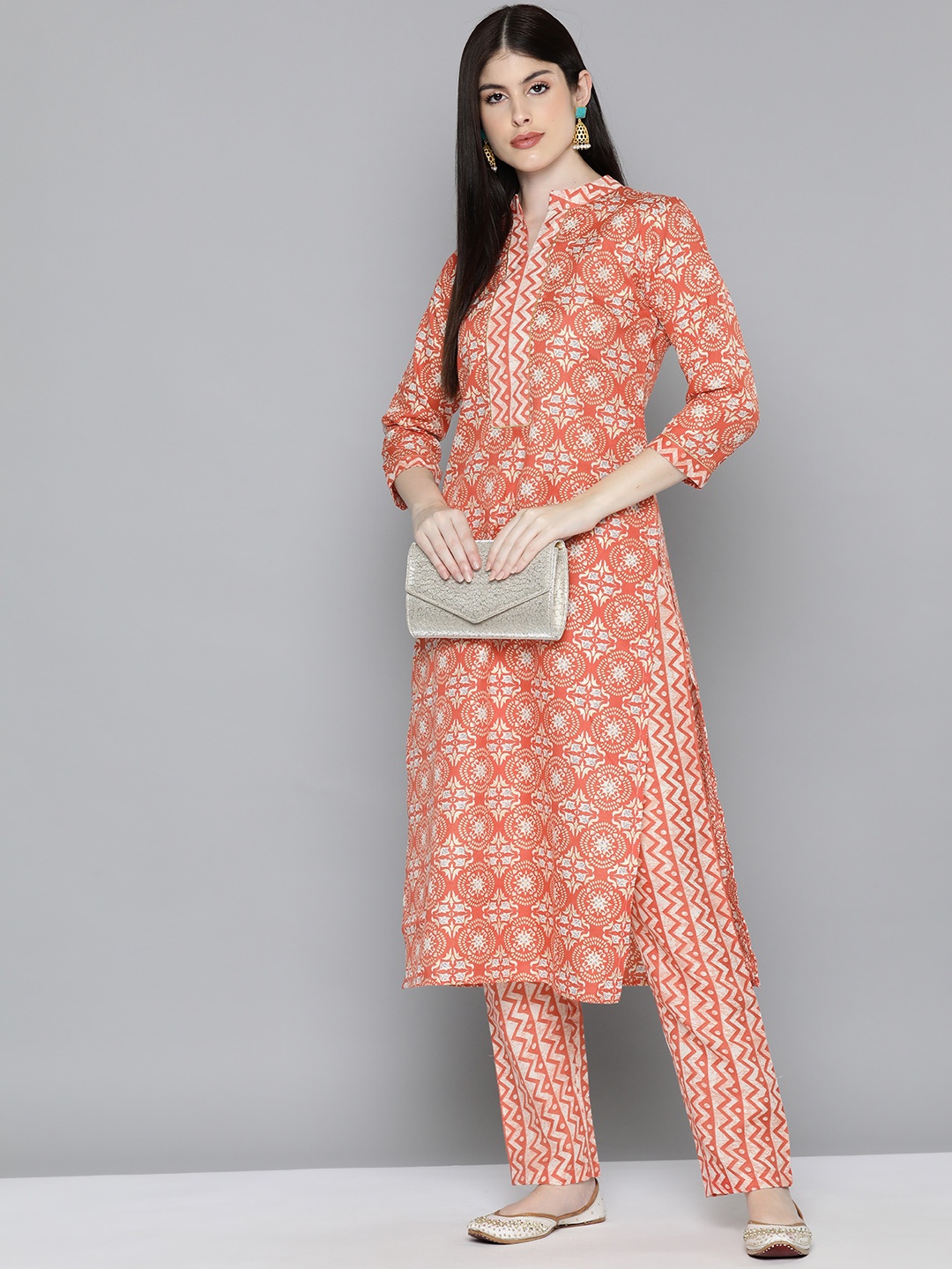 

Kvsfab Women Floral Printed Regular Kurta with Trousers, Orange