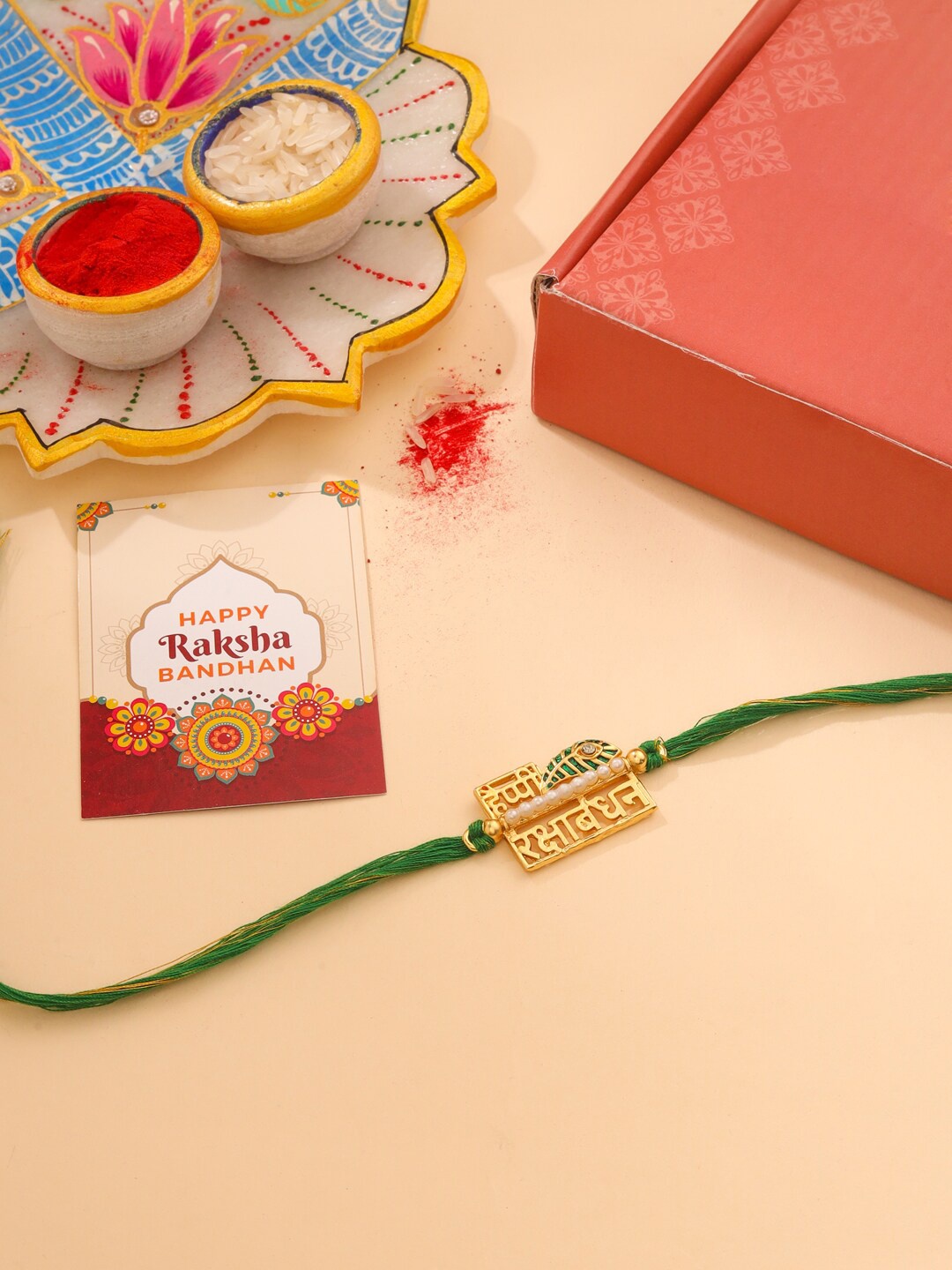 

Natures Buggy Men Gold Plated Happy Rakhshabhandhan Rakhi With Roli & Chawal