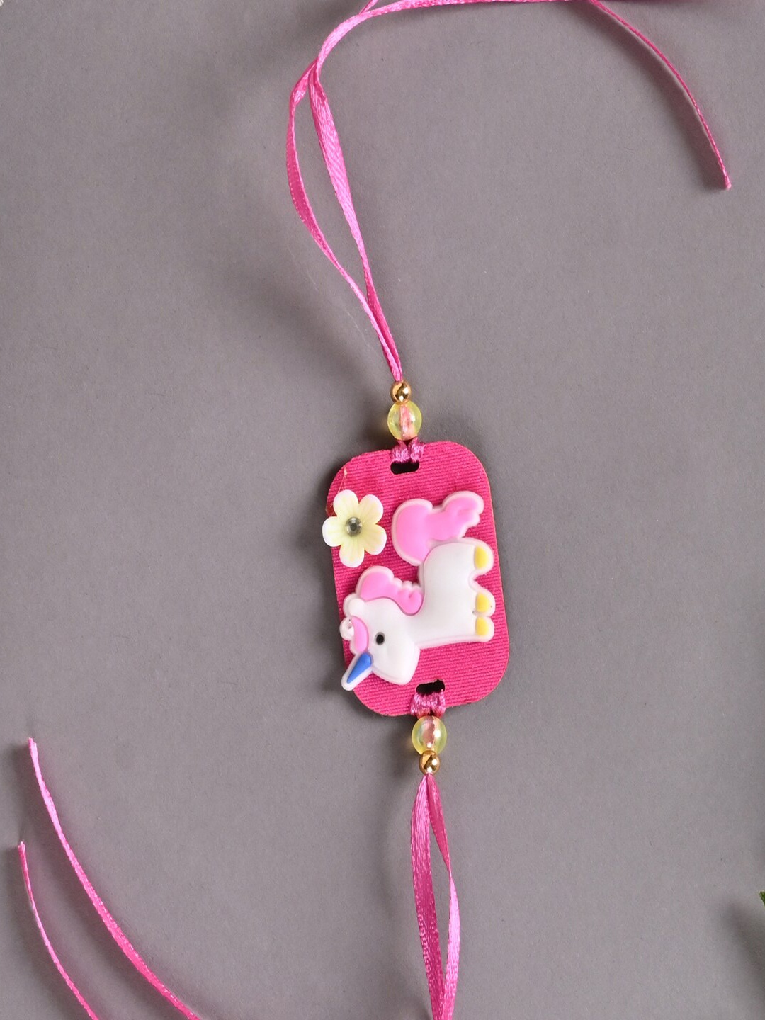 

Jewelz Unisex Unicorn Charm Rakhi, Pink