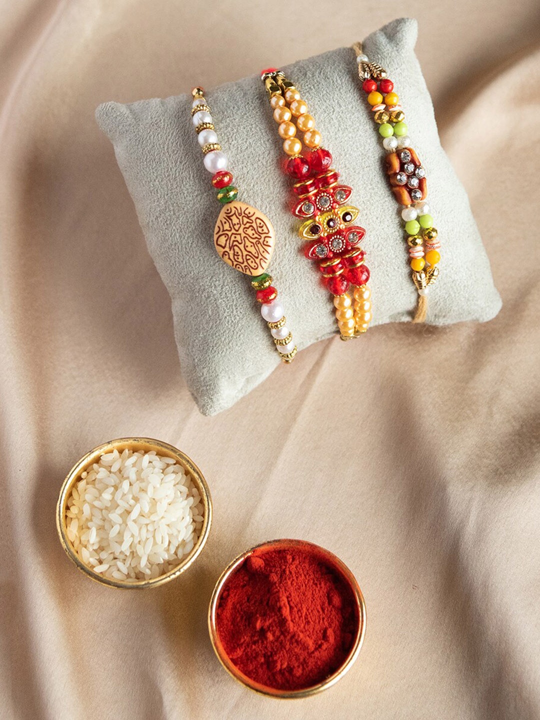 

Jewelz Unisex Set Of 3 Stone-Studded & Beaded Rakhi With Roli Chawal, Gold