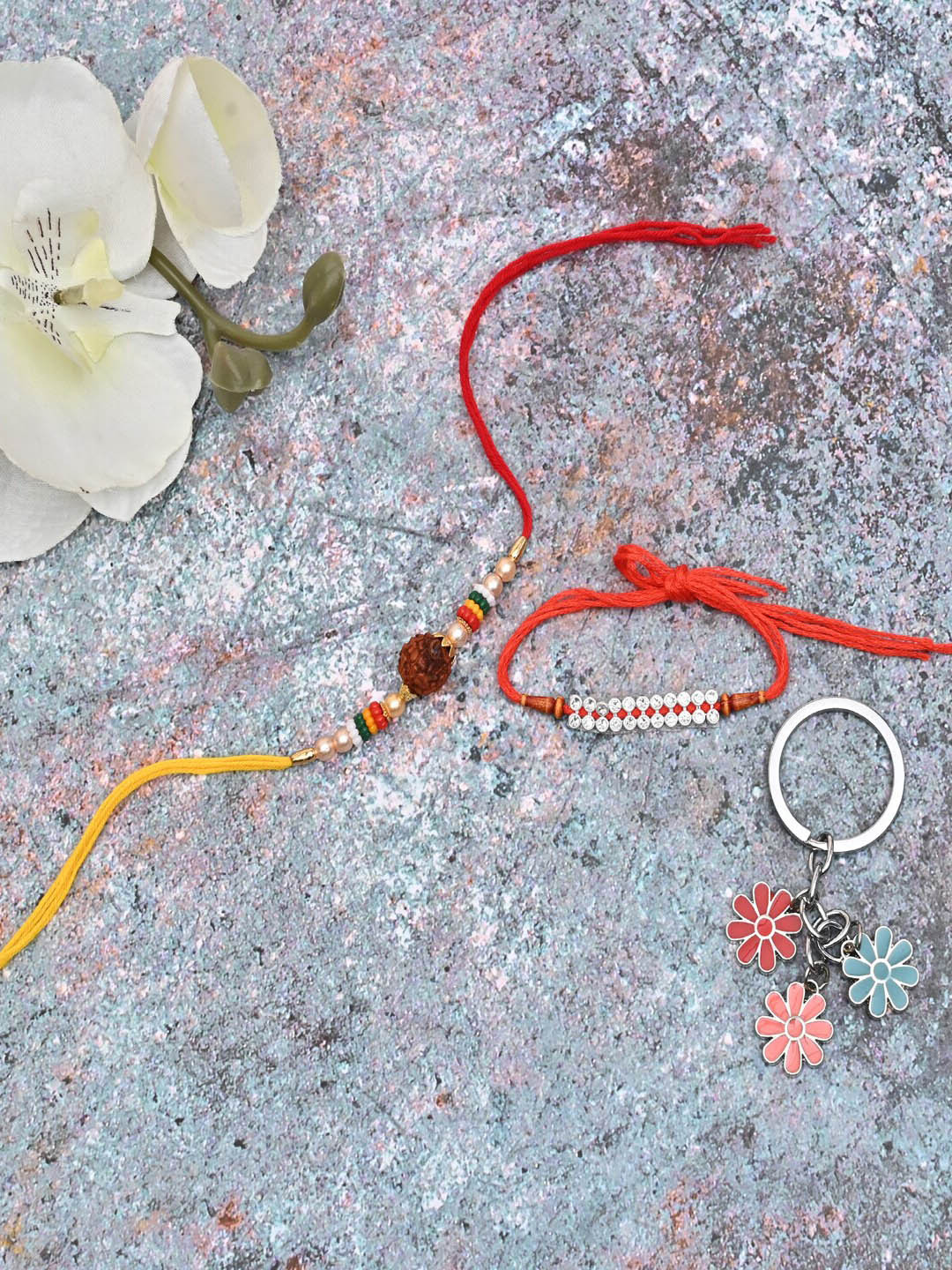 

Jewelz Unisex Rakhi Set With Key Chain, Blue