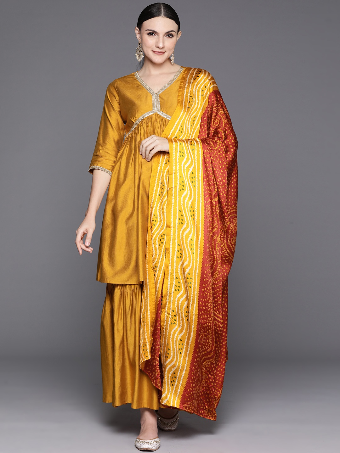 

Indo Era Women Empire Kurta with Sharara & With Dupatta, Mustard