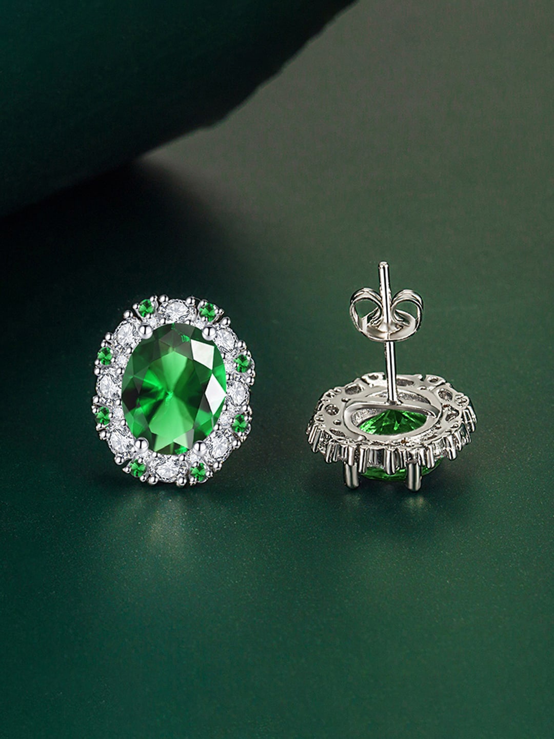 

Designs & You Silver-Plated Cubic Zirconia-Studded Oval Shaped Stud Earrings, Green