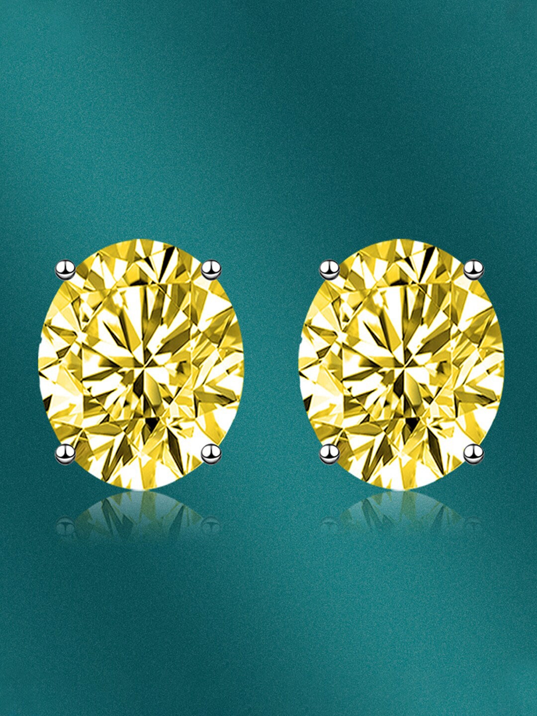 

Designs & You Silver-Plated Cubic Zirconia Studded Oval Studs Earrings
