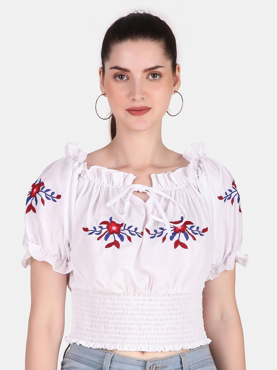 

Jollify Floral Embroidered Off- Shoulder Tie-Up Neck Smocked Crop Top, White