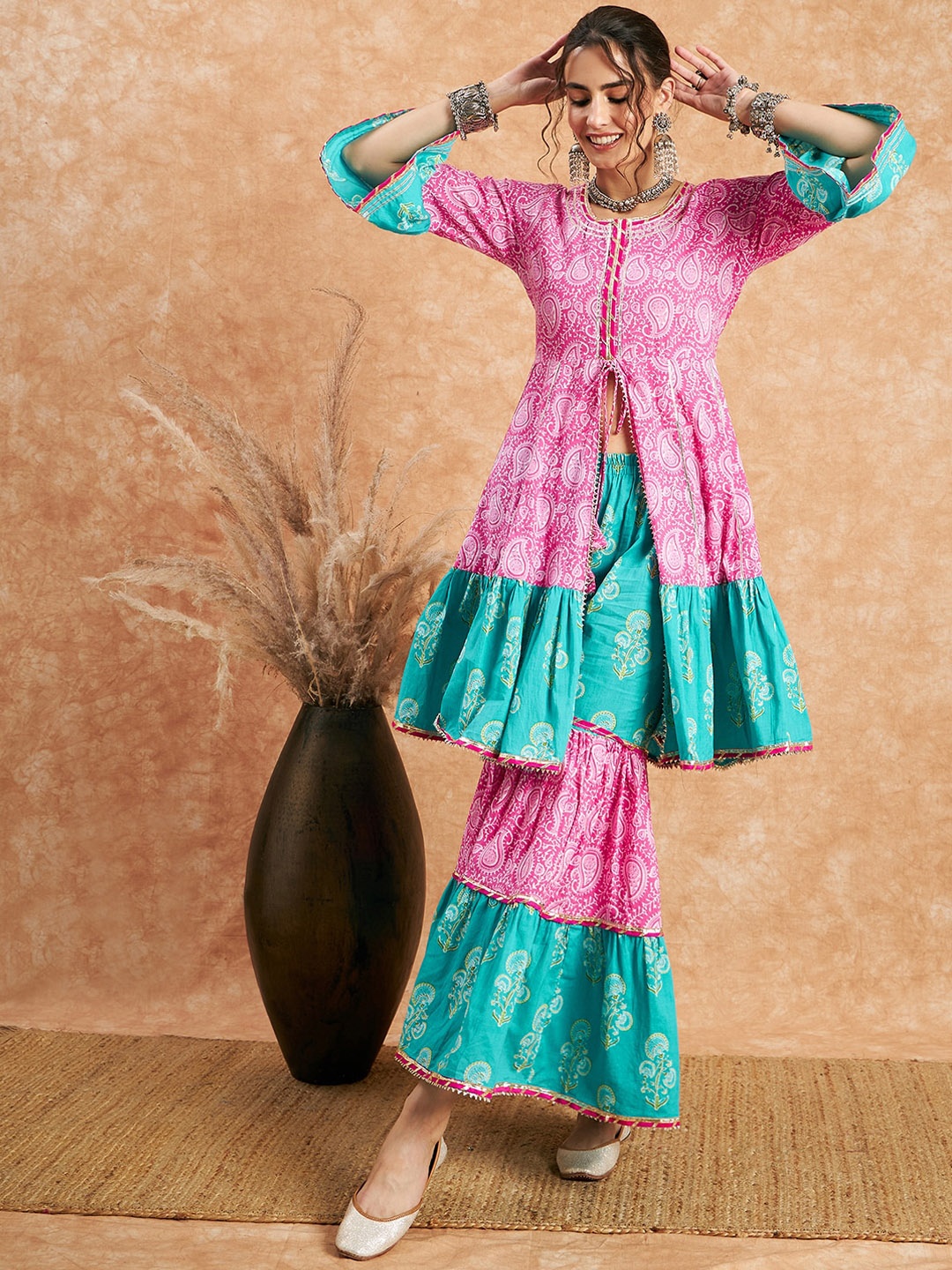 

Sangria Pink Ethnic Motifs Printed Bell Sleeves Pure Cotton A-Line Kurta With Sharara