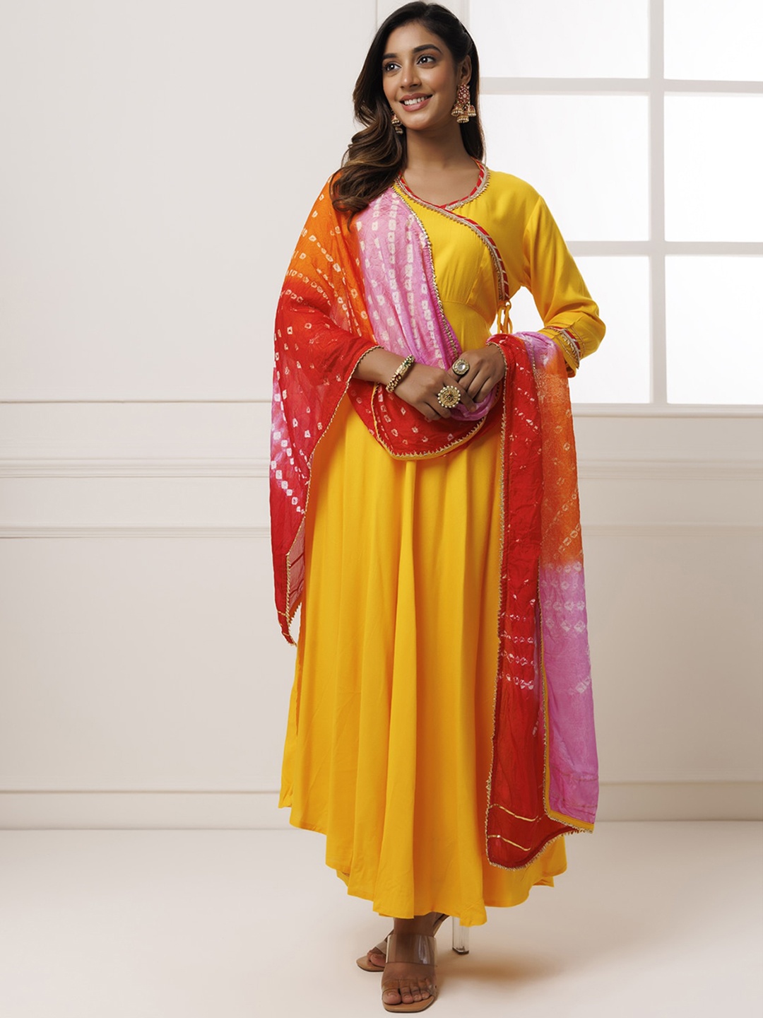 

Geroo Jaipur Yellow V-neck Angrakha Gotta Patti Kurta With Palazzos & Dupatta