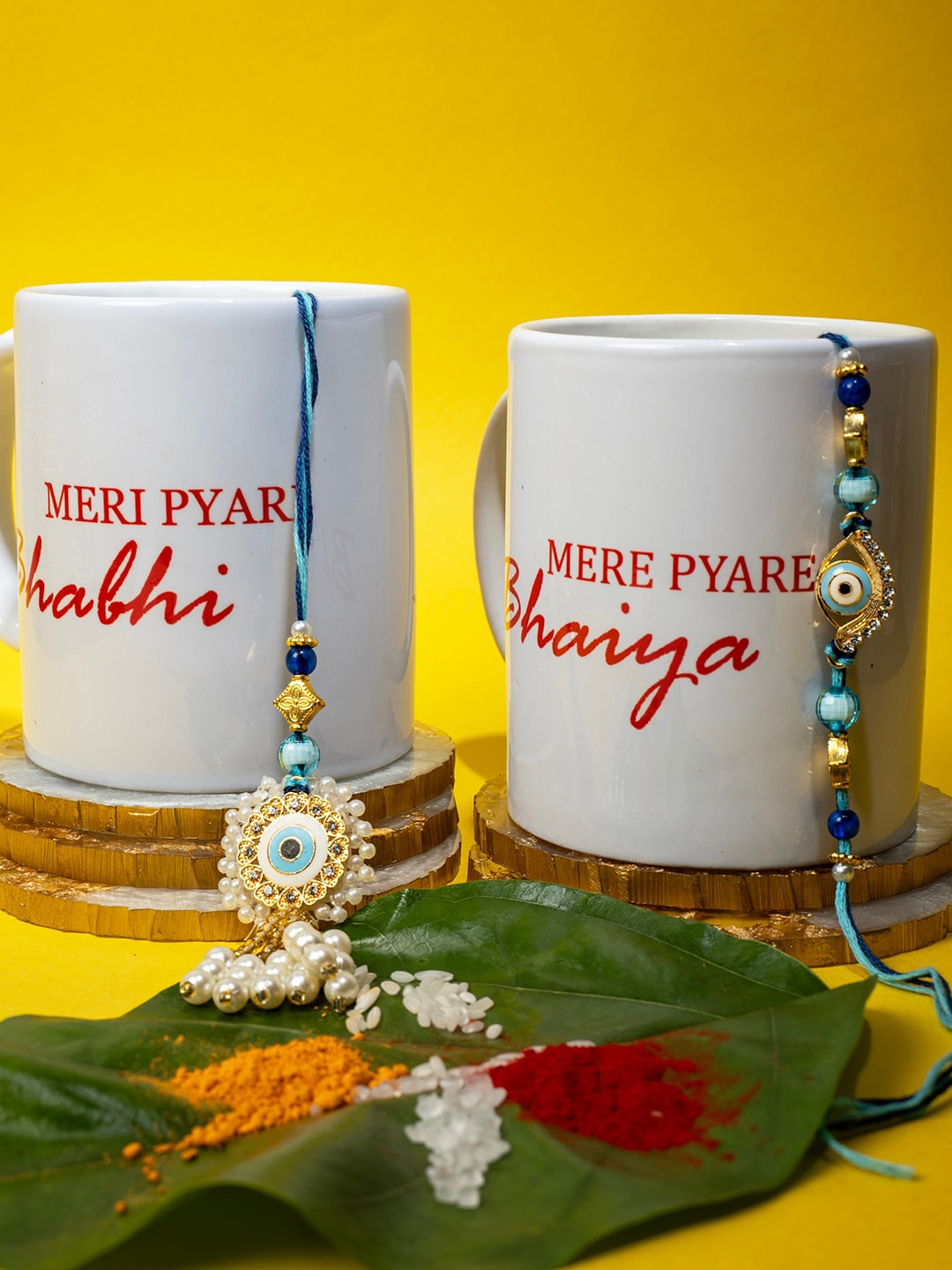 

PANASH Unisex Set Of 2 Gold-Plated Evil Eye Charm Rakhi With Mugs & Roli Chawal, Blue