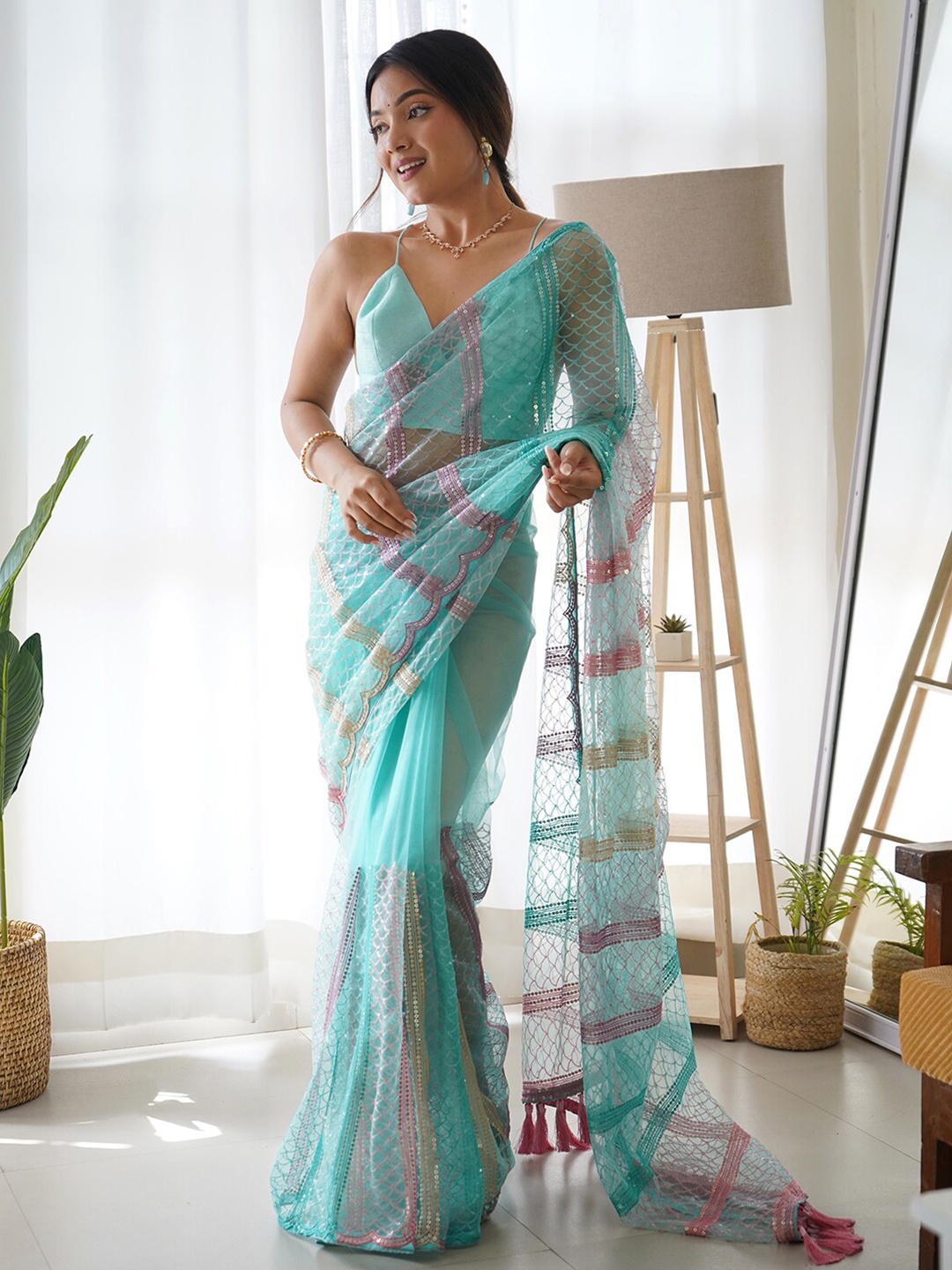 

Saree mall Blue & Pink Embellished Sequinned Net Sarees